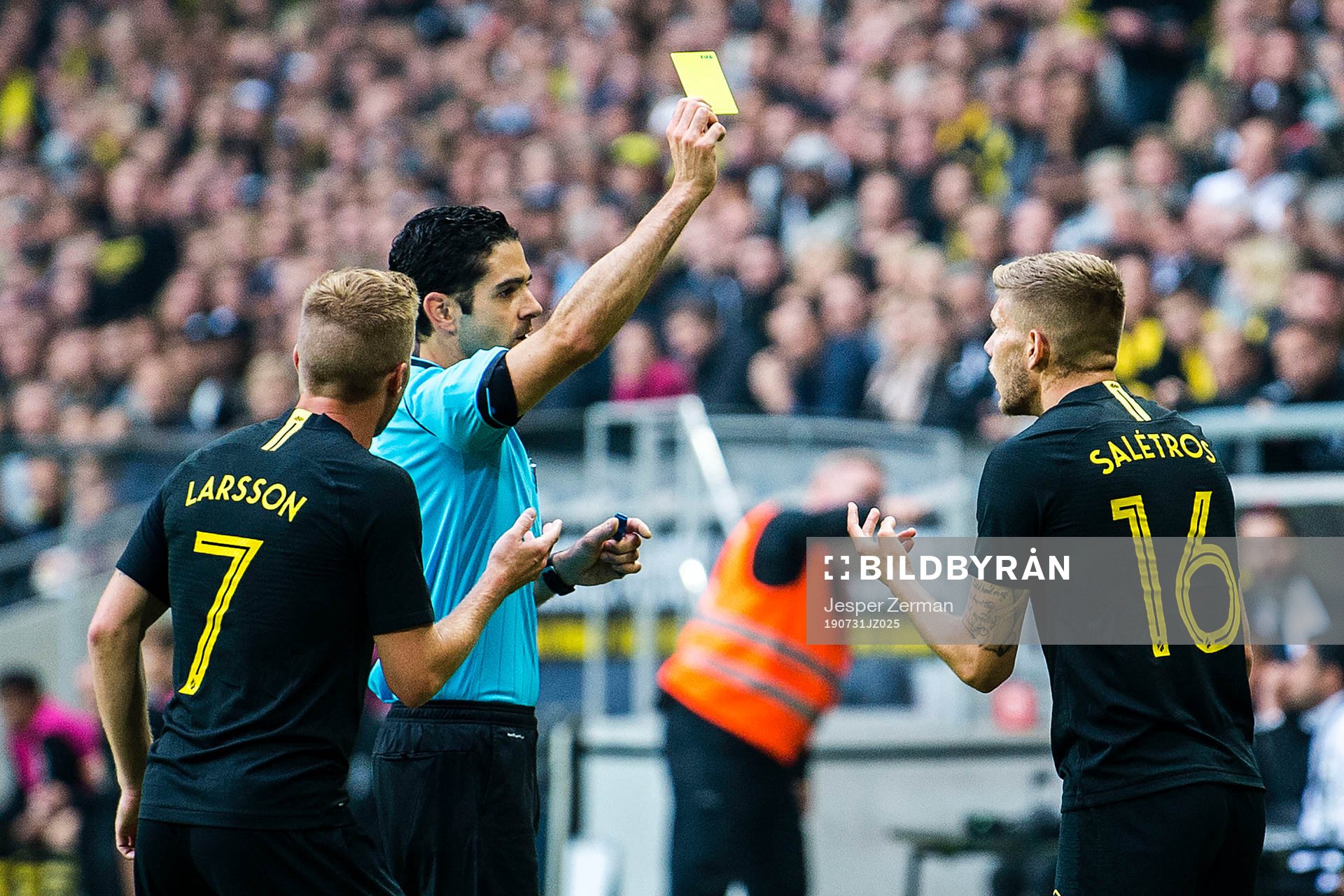 Anton Salétros of AIK gets a yellow card