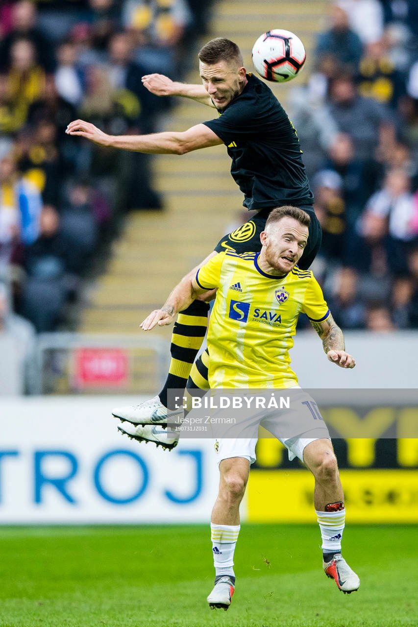 Karol Mets of AIK and Dino Hotic  of Maribor