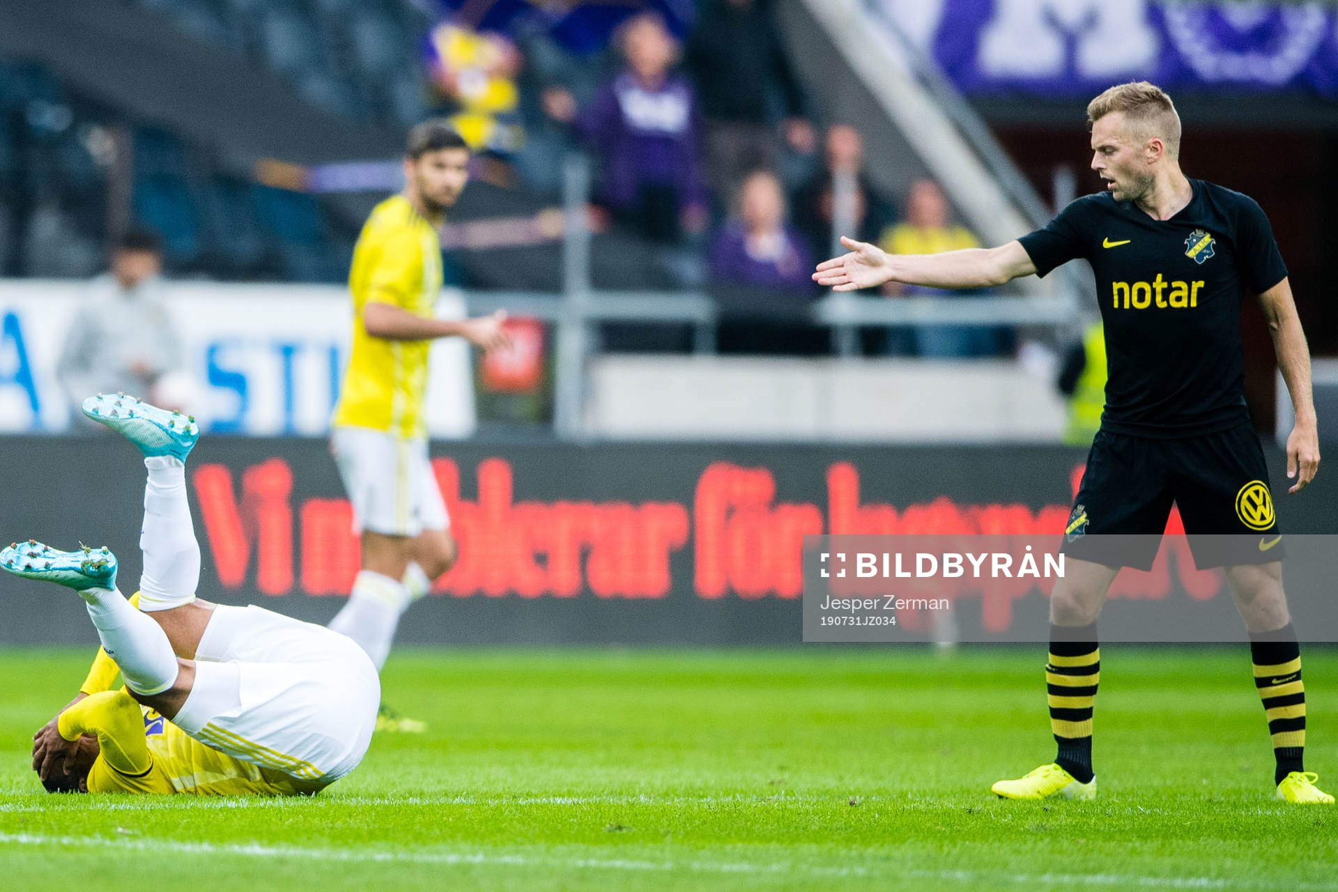Marcos Tavares of Maribor and Sebastian Larsson of AIK during the UEFA Champions League qualifying match between AIK and Maribor on July 31, 2019 in Stockholm.