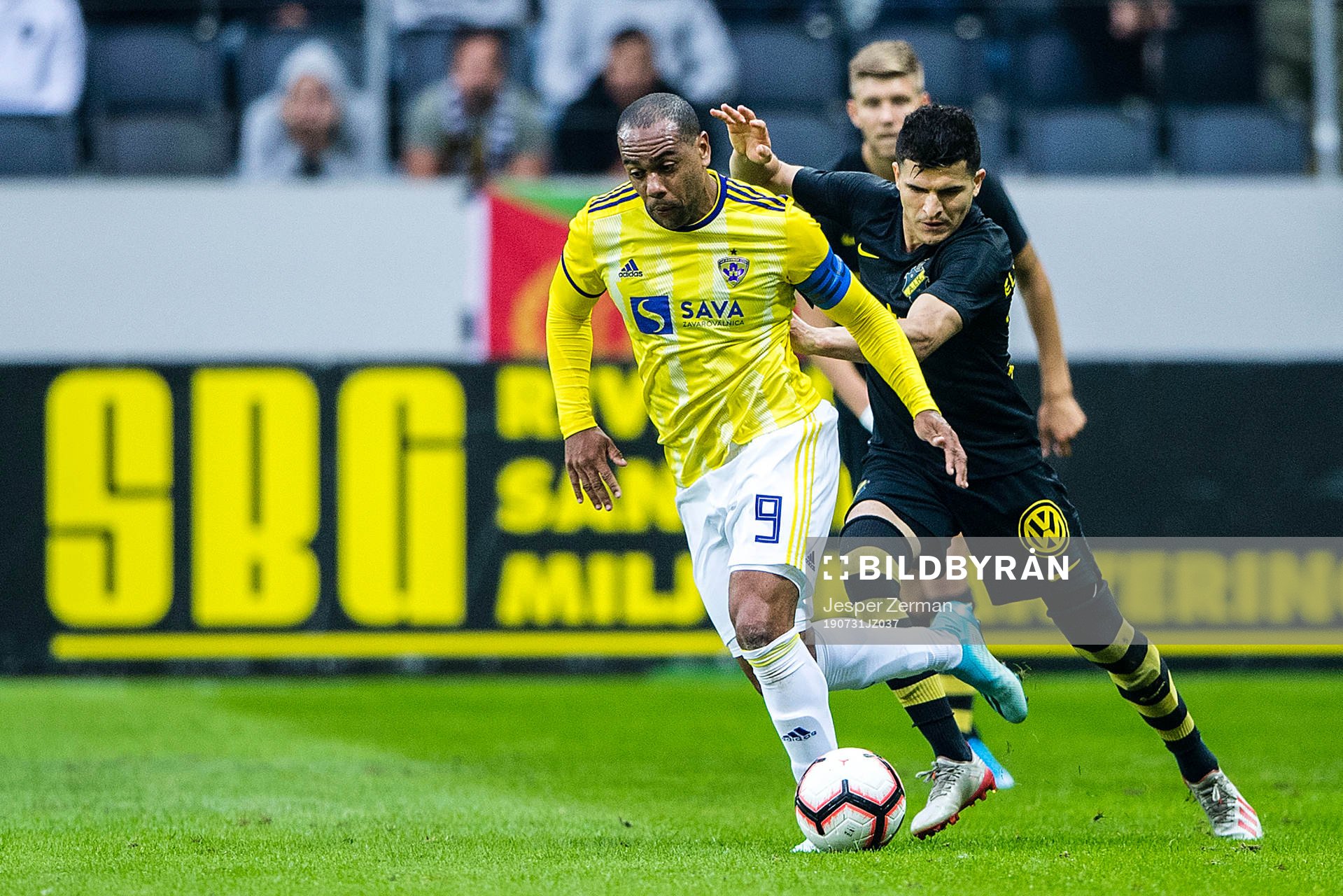 Marcos Tavares of Maribor and Tarik Elyounoussi of AIK during the UEFA Champions League qualifying match between AIK and Maribor on July 31, 2019 in Stockholm.