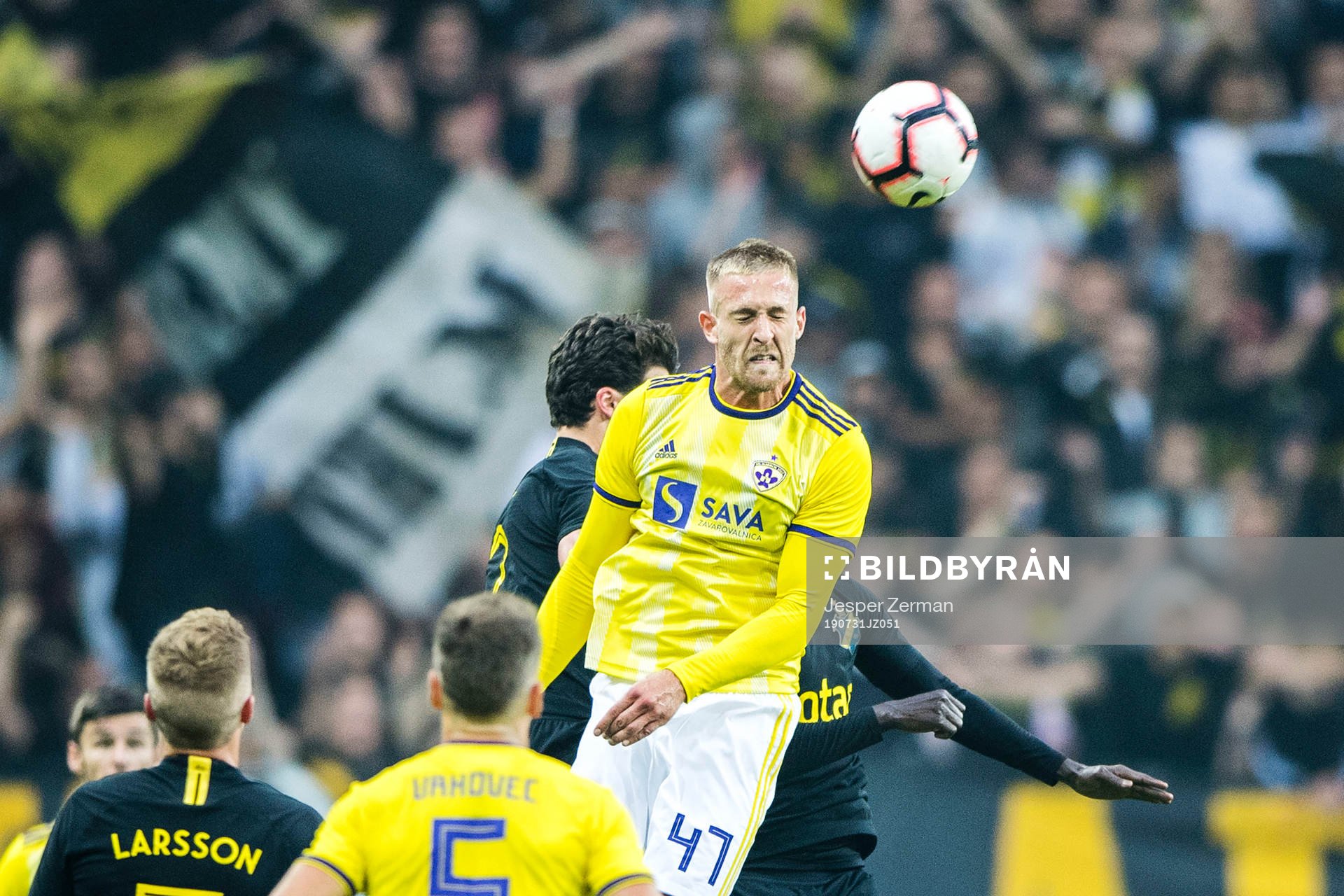 Andrej Kotnik of Maribor and Daniel Granli and Enoch Kofi Adu of AIK during the UEFA Champions League qualifying match between AIK and Maribor on July 31, 2019 in Stockholm.