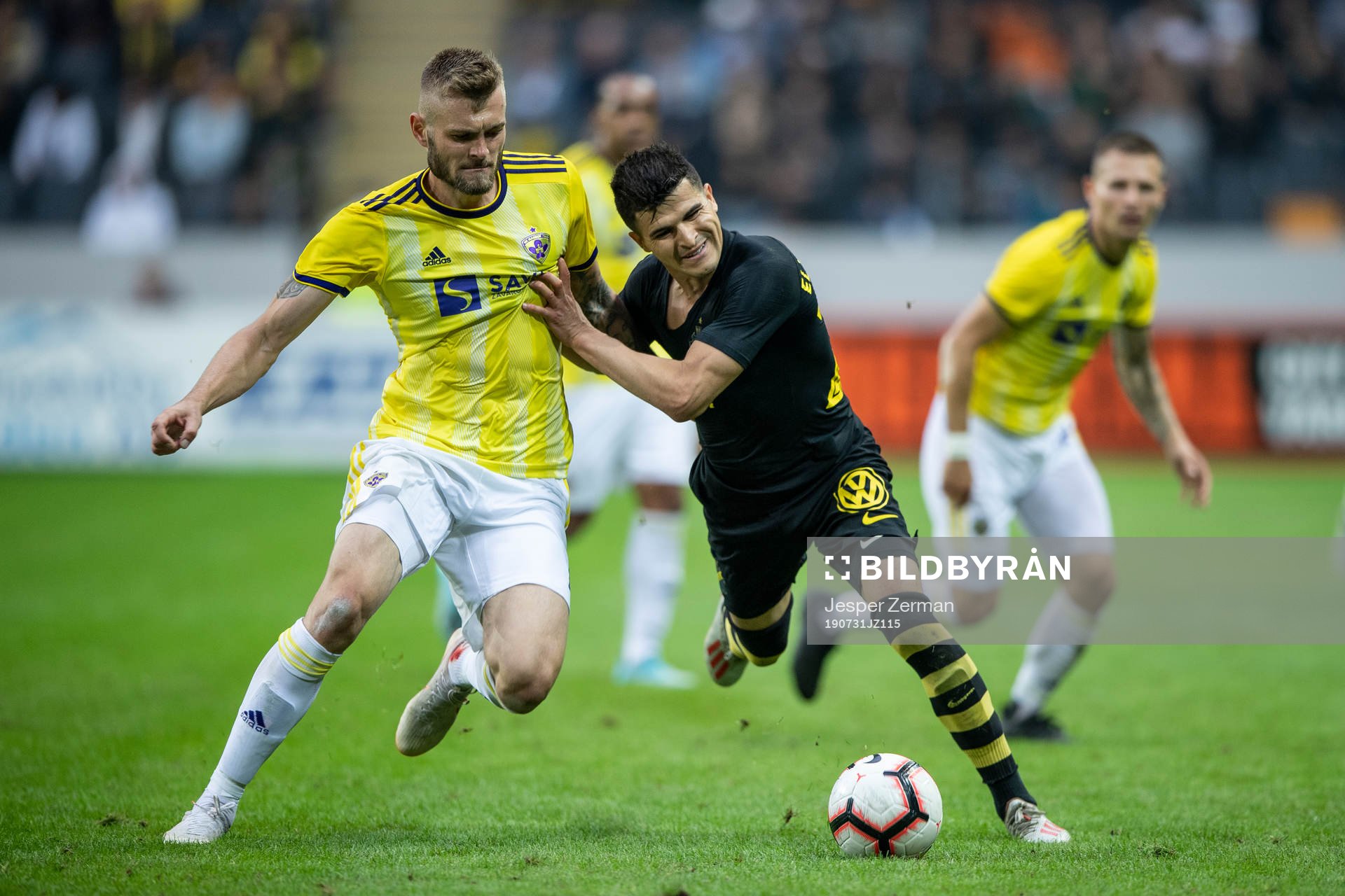 Alexandru Cretu of Maribor and Tarik Elyounoussi of AIK