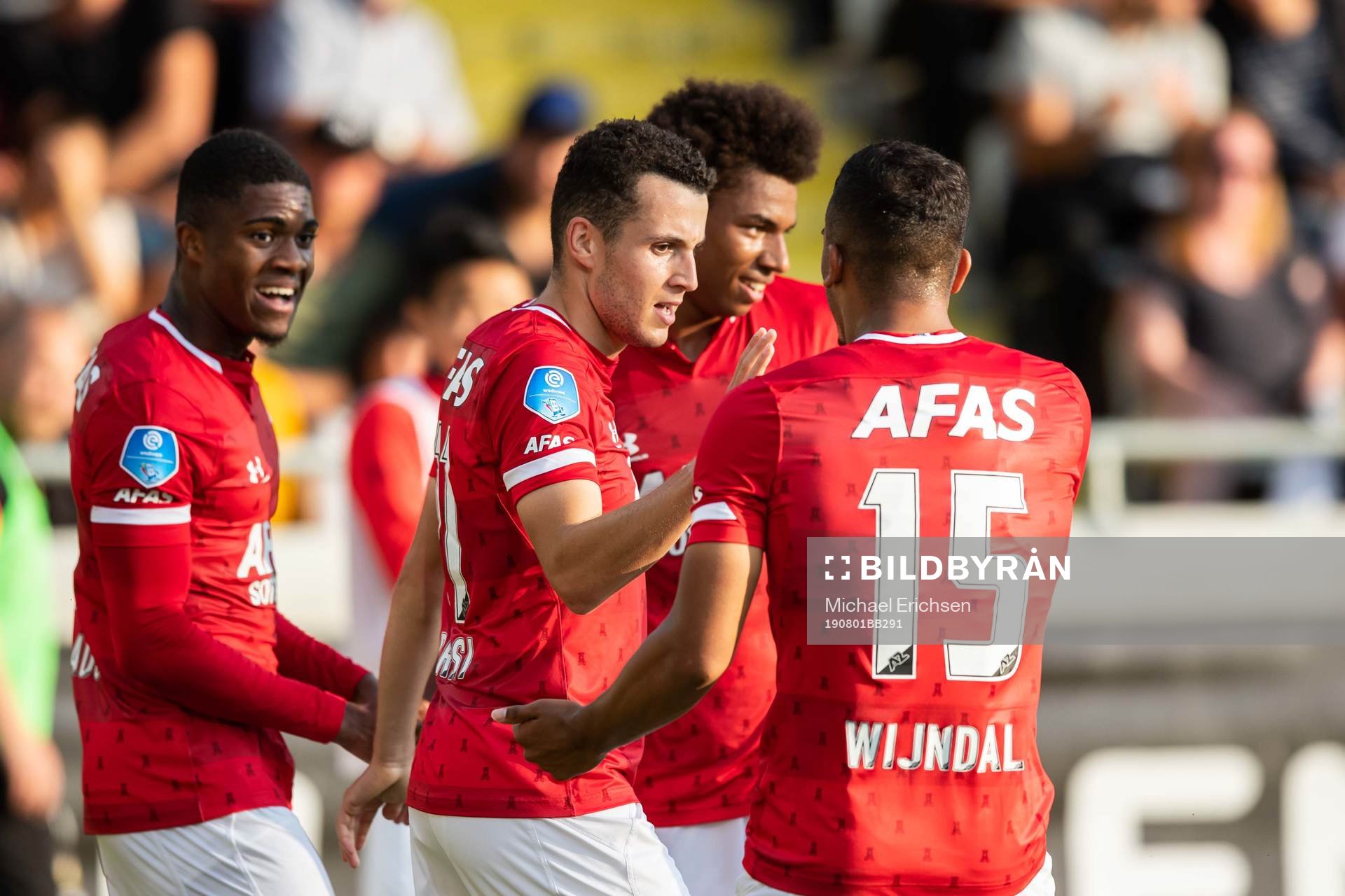 Oussama Idrissi of AZ Alkmaar celebrate with teammates