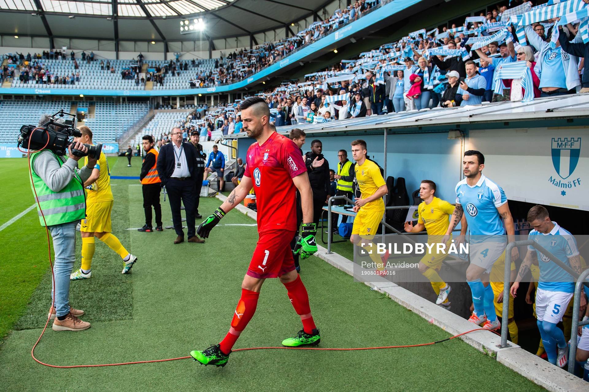 Goalkeeper Dusan Melicharek of Malmö FF enters the pitch