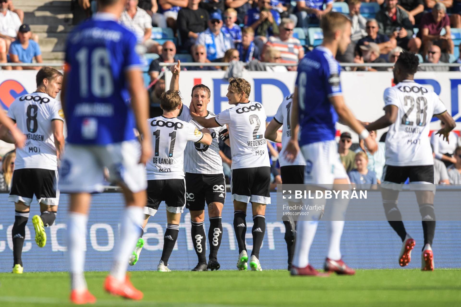 Mike Jensen of Rosenborg celebrate with teammates