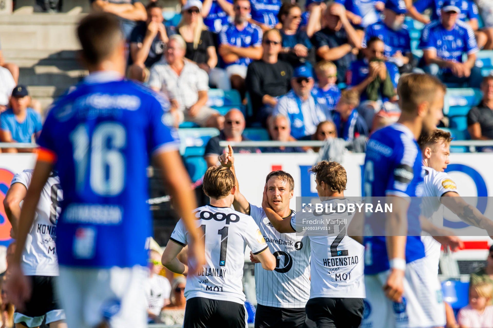 Mike Jensen of Rosenborg celebrates with his teammates after scoring 1-1 during the Eliteserien match between Sarpsborg 08 and Rosenborg on August 3, 2019 in Oslo.
