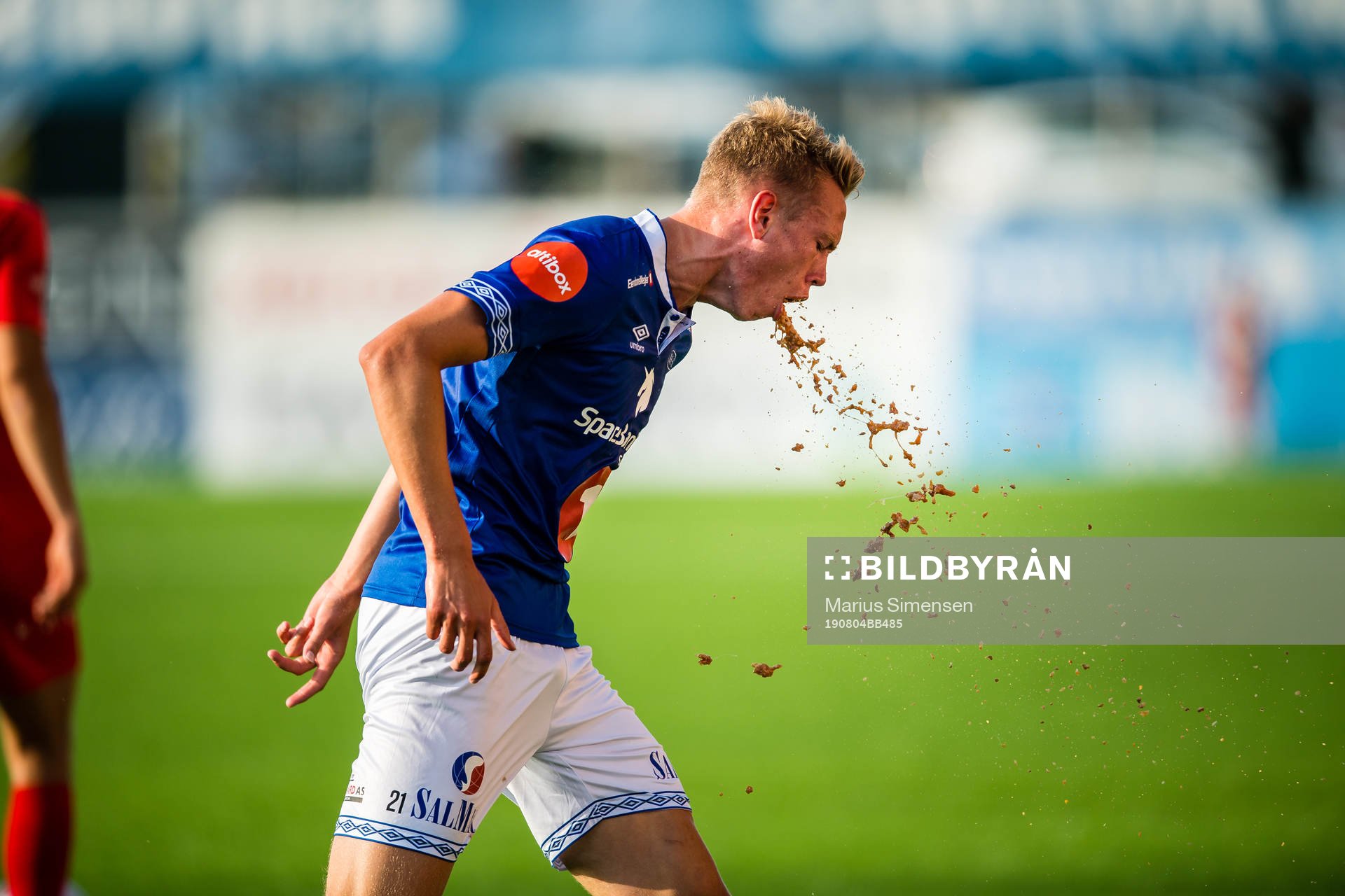 Torbjørn Lysaker Heggem of Ranheim throws up
