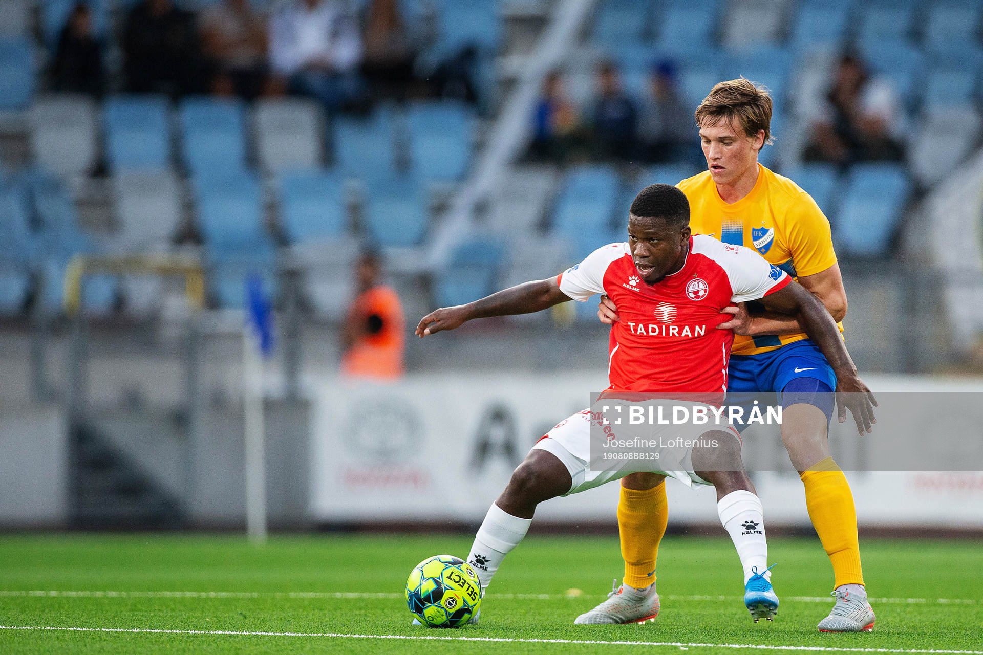 Nigel Hasselbaink of Hapoel Beer-Sheva and Rasmus Lauritsen