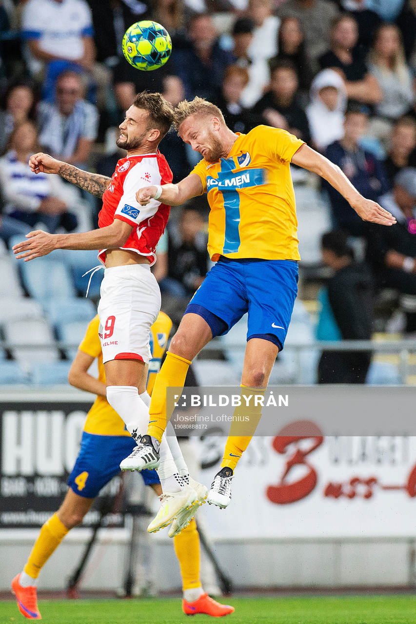 Kasper Larsen of IFK Norrköping and Jose Angel Carrillo of