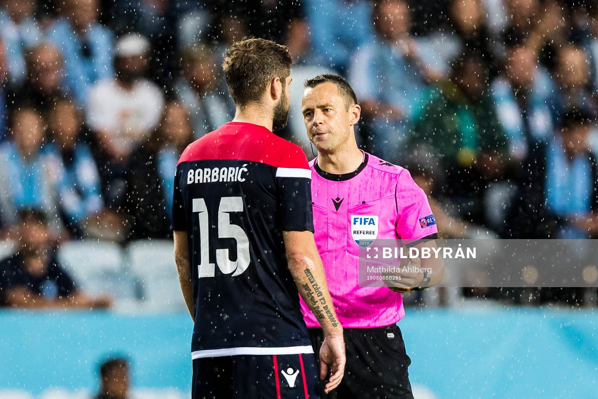 Tomislav Barbaric of Zrinjski and referee Stuart Attwell