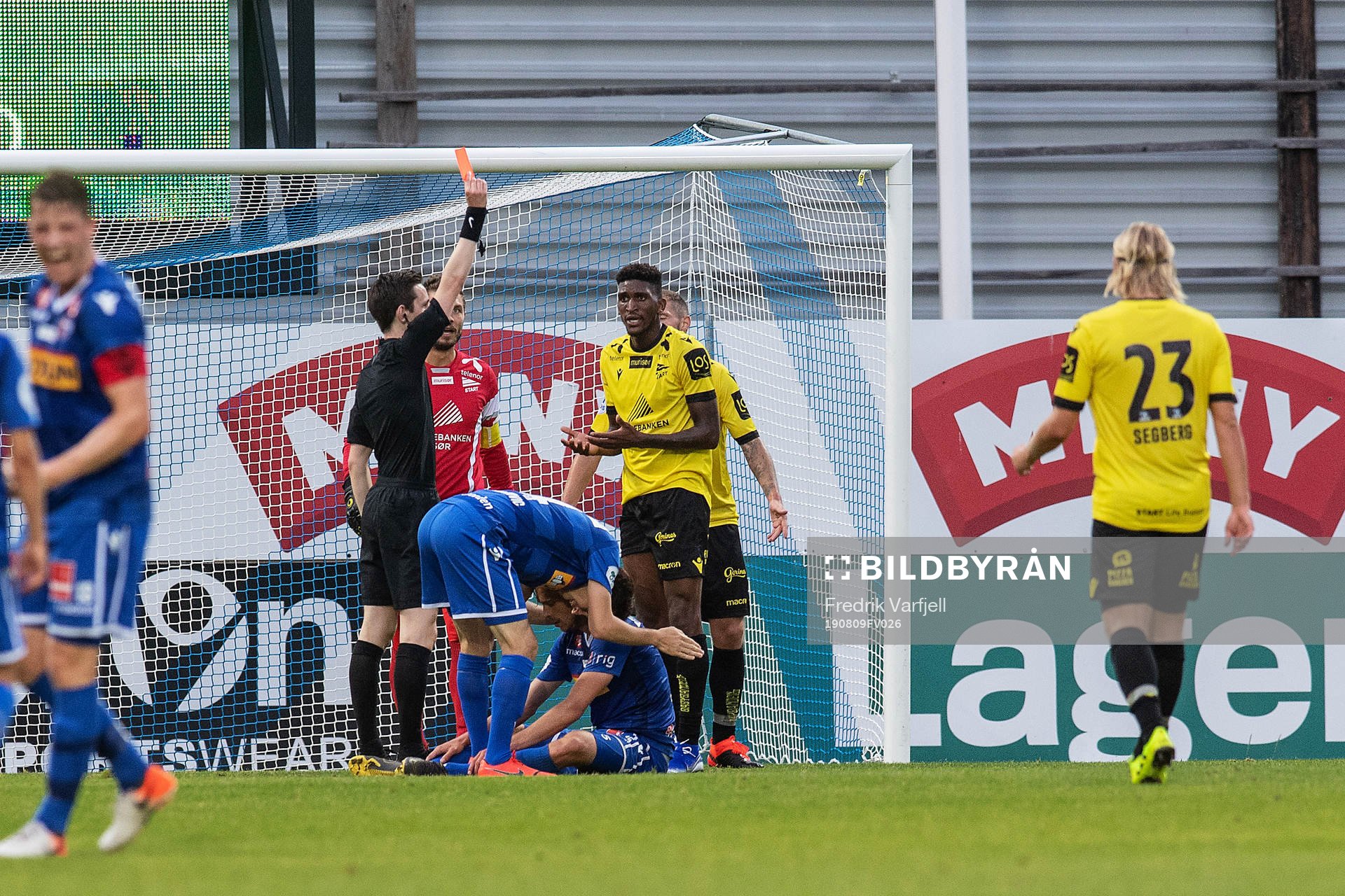 Damion Lowe of Start is shown a red card
