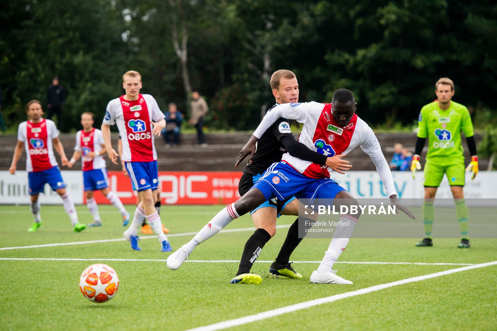Vegard Østraat Erlien of Sandnes Ulf and Mansour Gueye of
