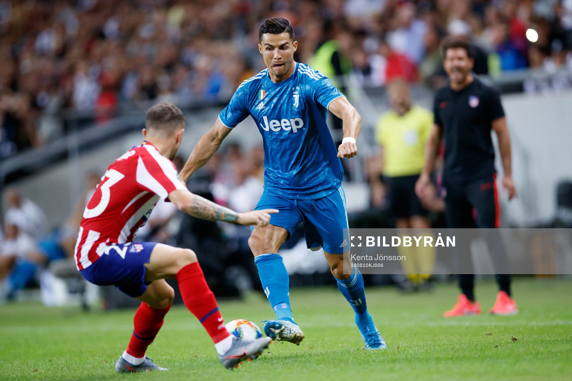 Kieran Trippier of Atletico Madrid and Cristiano Ronaldo of