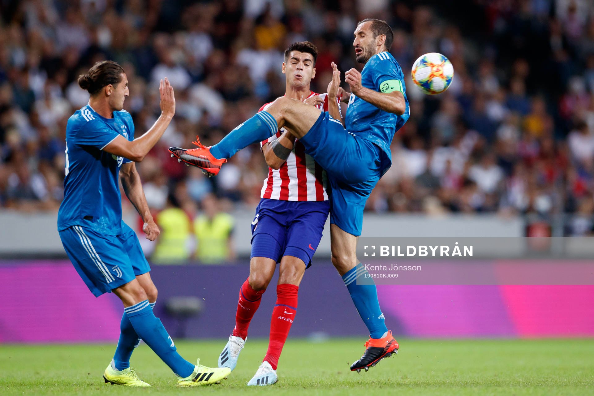 Adrien Rabiot and Giorgio Chiellini of Juventus against Alvaro Morata of Atletico Madrid during the International Champions Cup match between Atletico Madrid and Juventus on August 10, 2019 in Stockholm. 