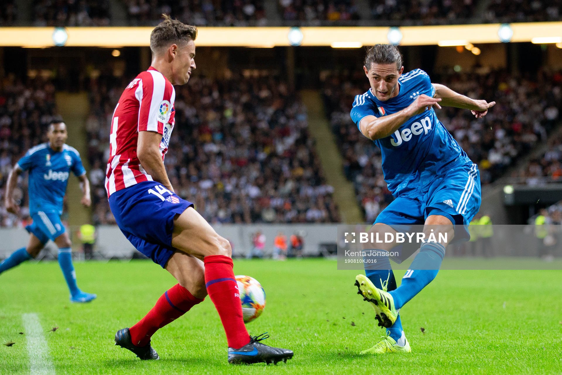 Kieran Trippier of Atletico Madrid and Adrien Rabiot of