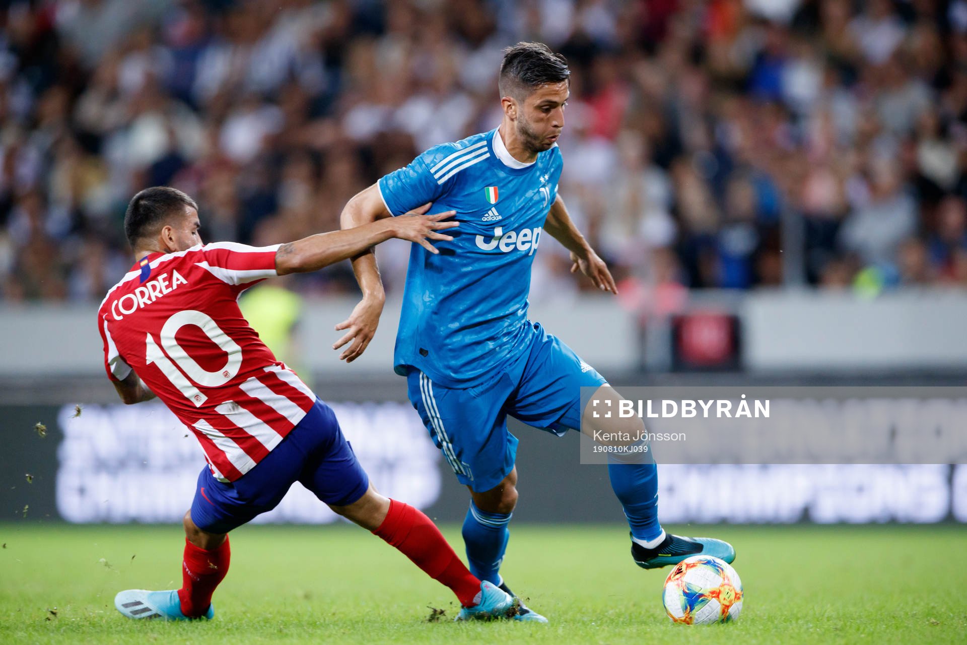Angel Correa of Atletico Madrid and Emre Can of Juventus