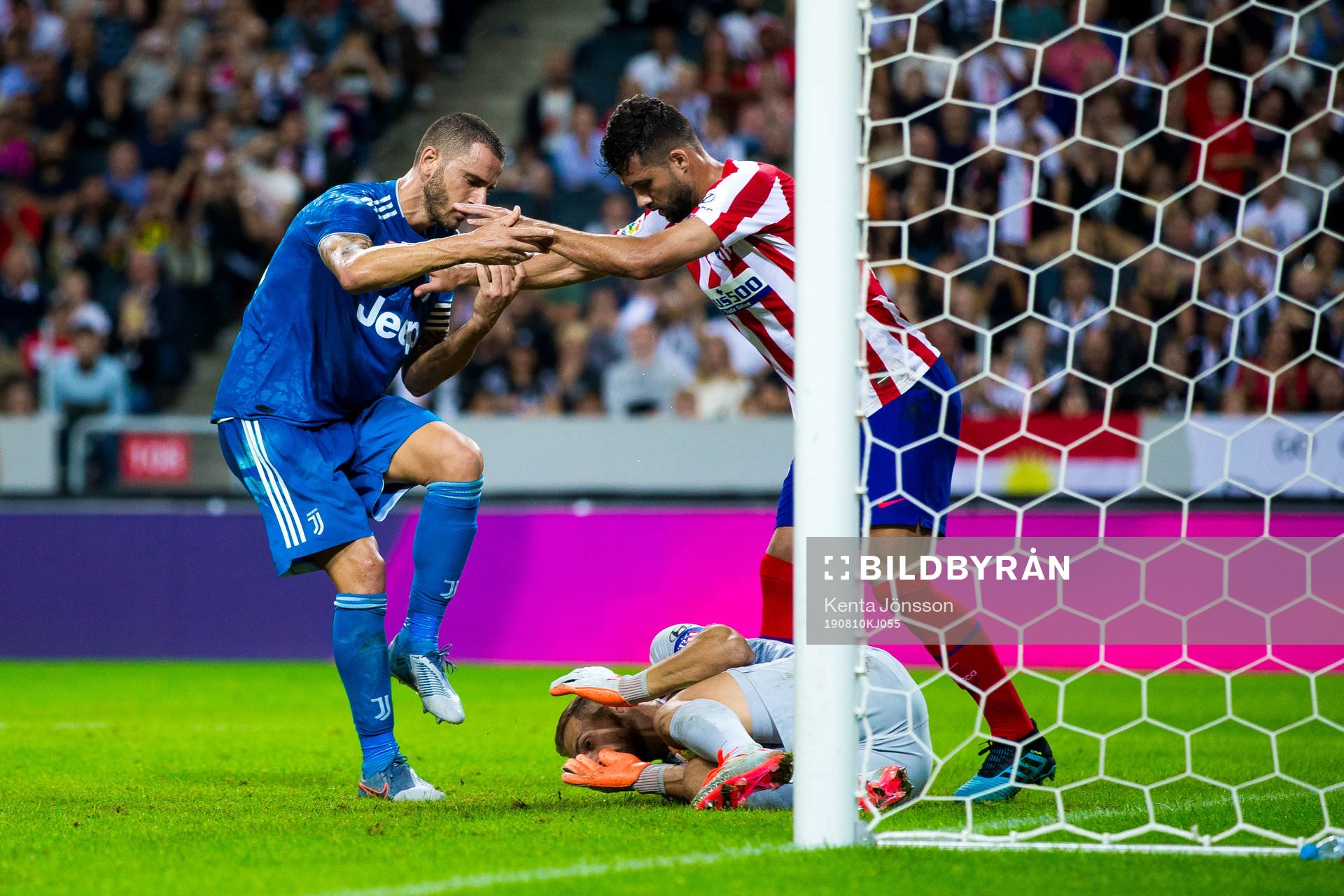 Leonardo Bunucci of Juventus, Saul Niguez and goalkeeper