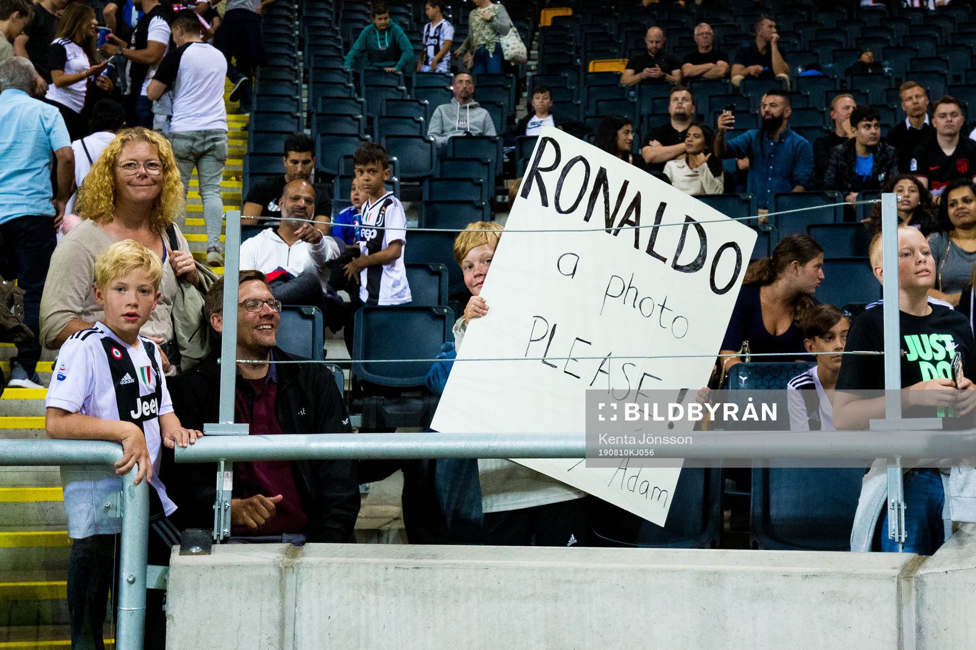 Supporters of Juventus with a sign with Cristiano Ronaldo