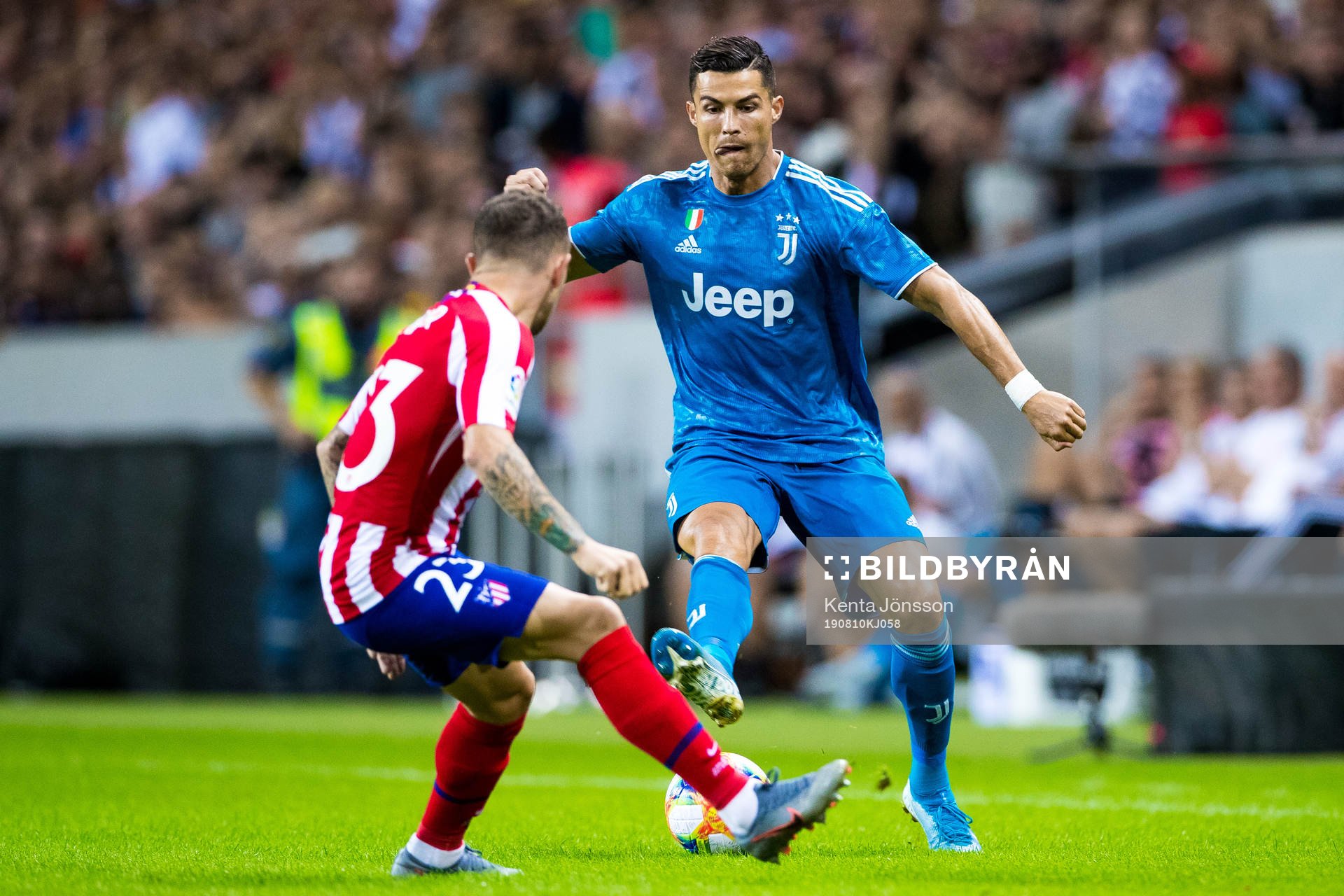 Kieran Trippier of Atletico Madrid and Cristiano Ronaldo of