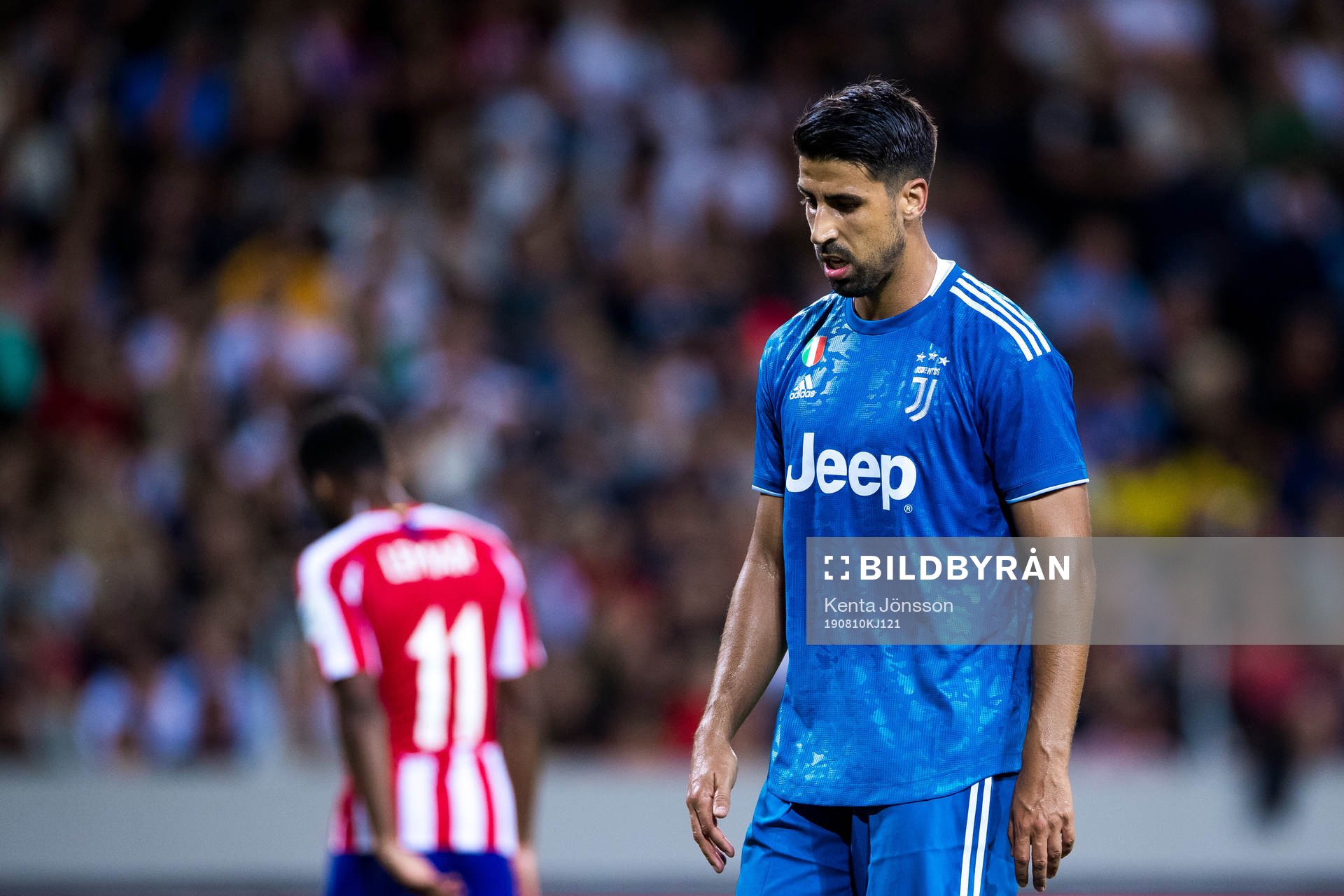 Sami Khedira of Juventus looks dejected