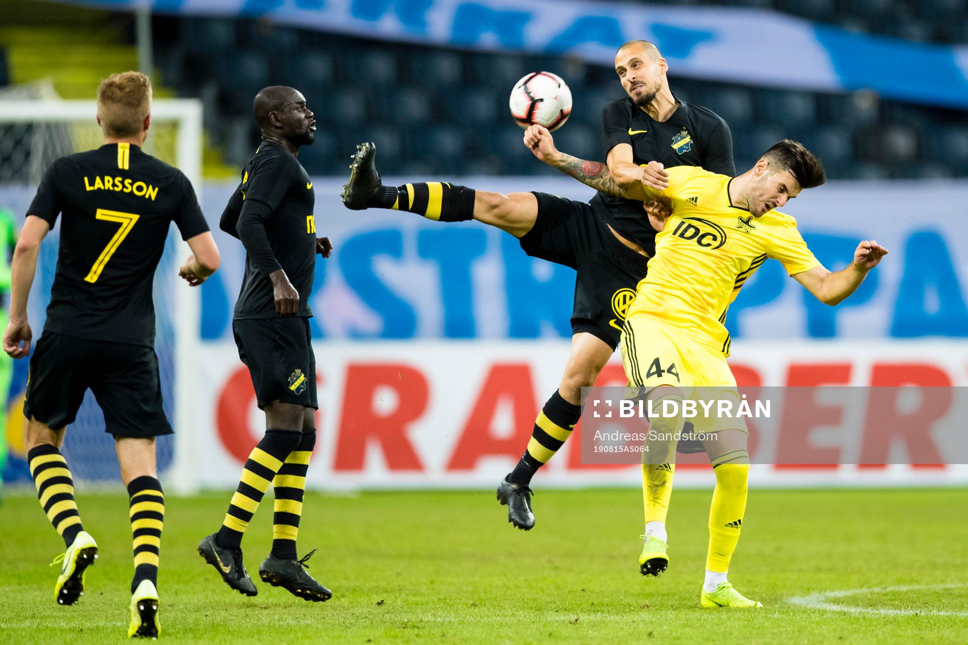 Panajotis Dimitriadis of AIK battles for the ball with