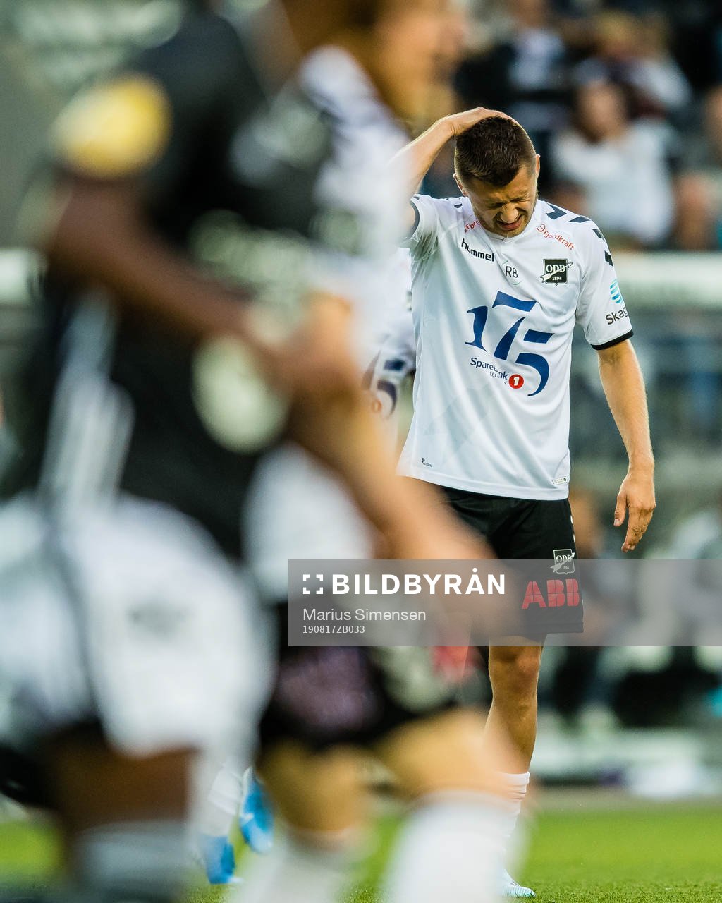Vebjørn Alvestad Hoff of Odd in pain during the Eliteserien match between Odd and Rosenborg on August 17, 2019 in Skien.
