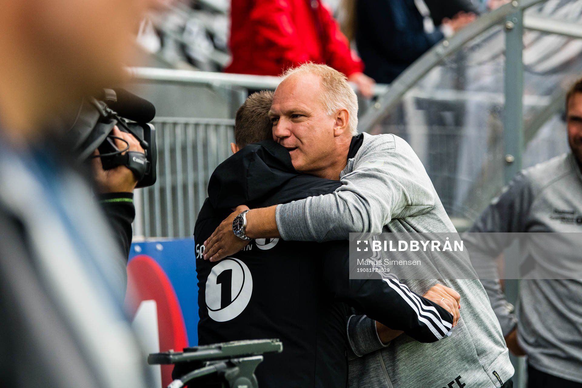 Dag-Eilev Fagermo, head coach of Odd,  hugs Eirik