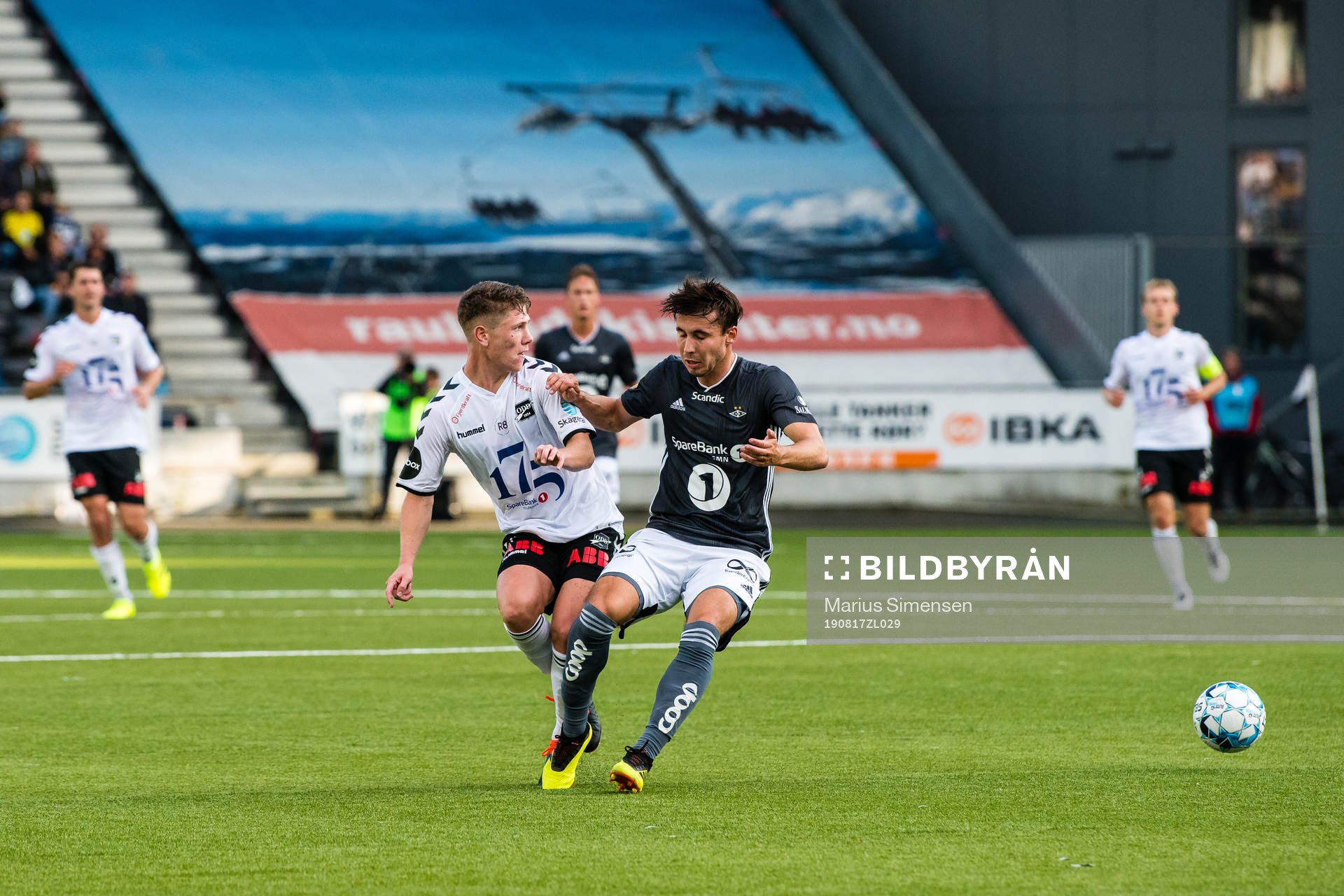 Markus André Kaasa of Odd and Anders Trondsen of Rosenborg during the Eliteserien match between Odd and Rosenborg on August 17, 2019 in Skien.