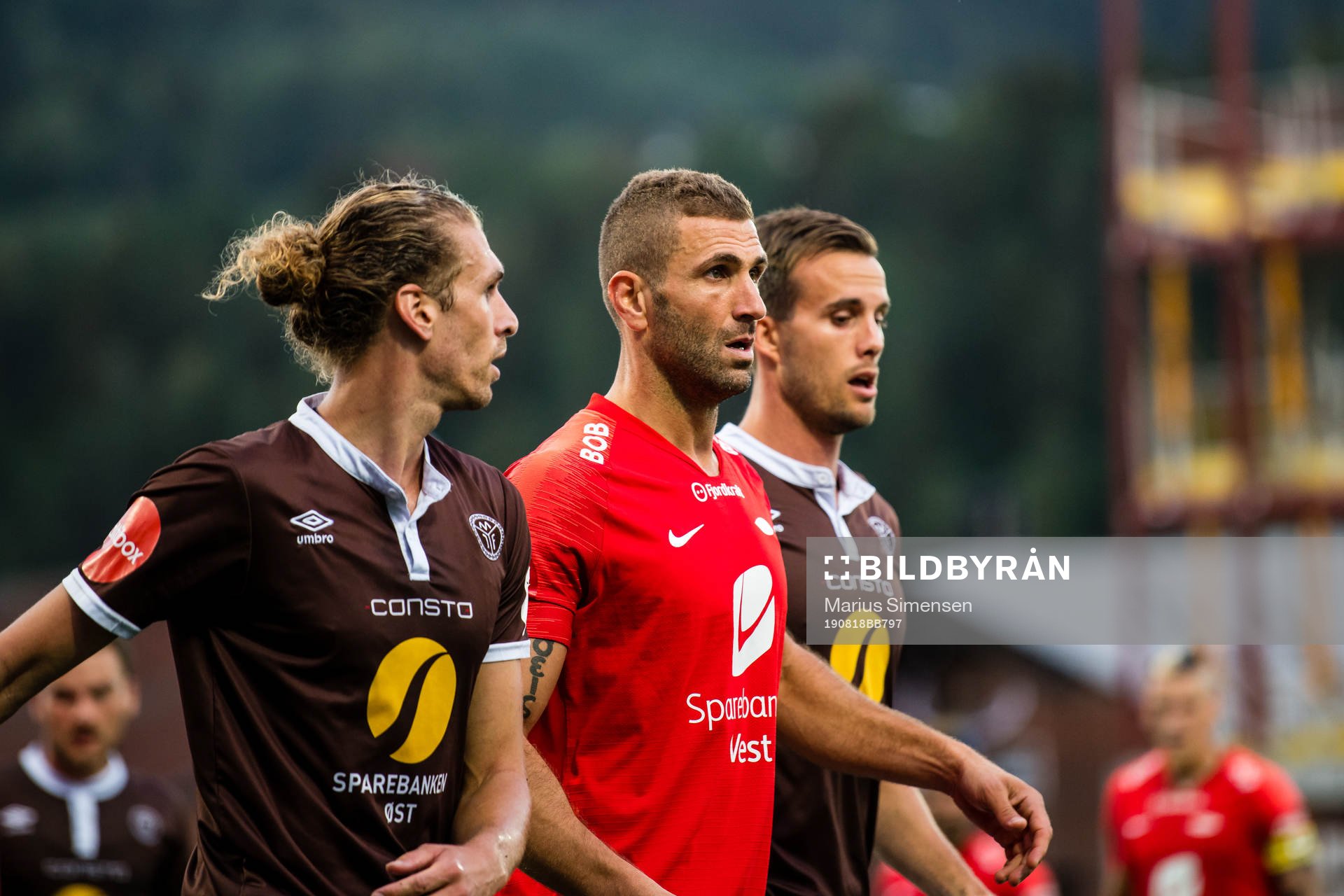Quint Arie Jansen of Mjøndalen and Azar Karadas of Brann during the Eliteserien match between Mjøndalen and Brann on August 18, 2019 in Mjøndalen.
