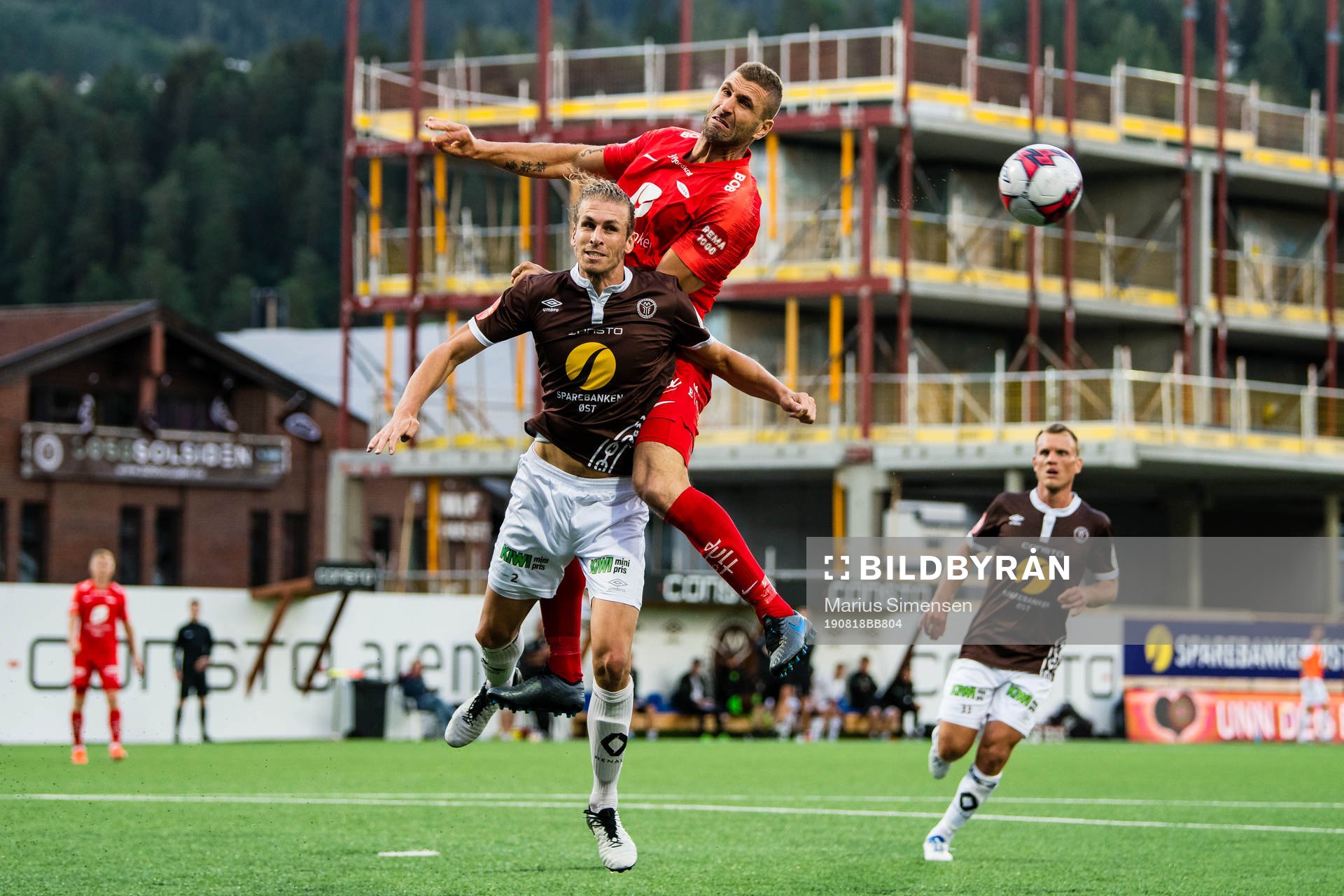 Quint Arie Jansen of Mjøndalen and Azar Karadas of Brann during the Eliteserien match between Mjøndalen and Brann on August 18, 2019 in Mjøndalen.