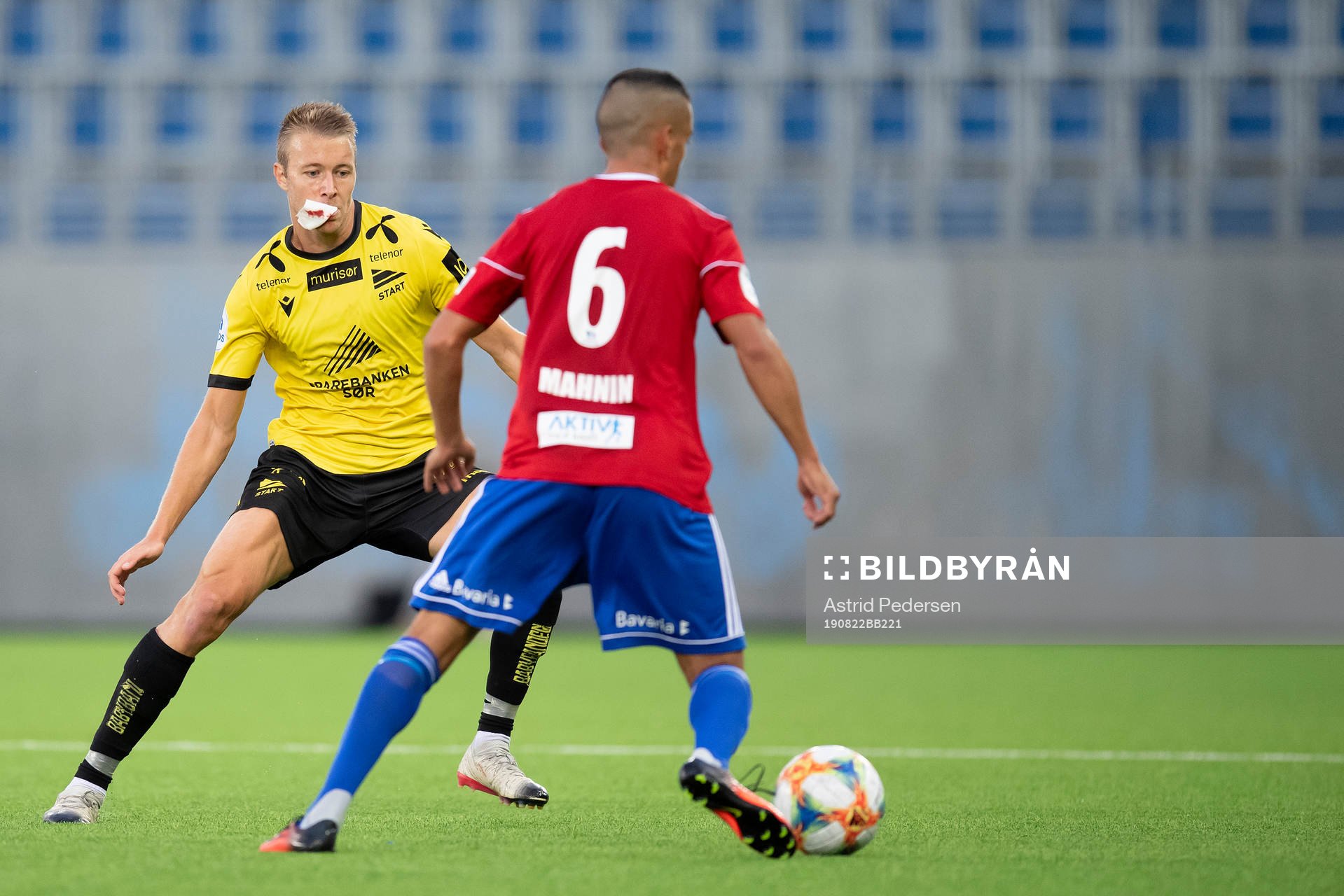 Henrik Robstad of Start and Mohammed Mahnin of Skeid