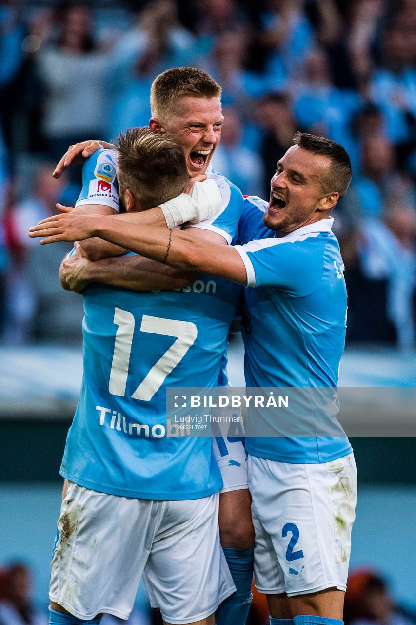 Anders Christiansen and Eric Larsson hugs Rasmus Bengtsson