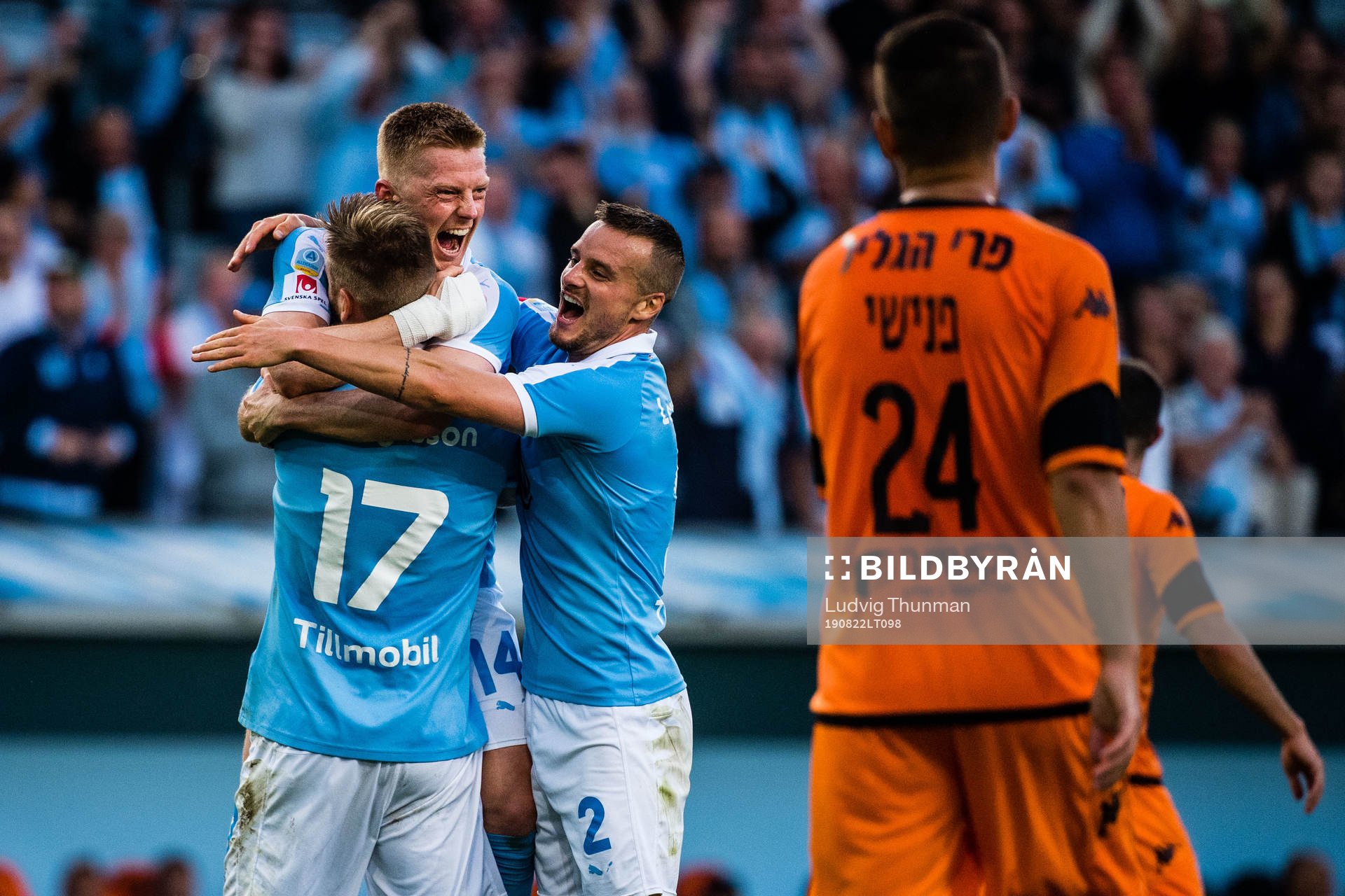 Anders Christiansen and Eric Larsson hugs Rasmus Bengtsson