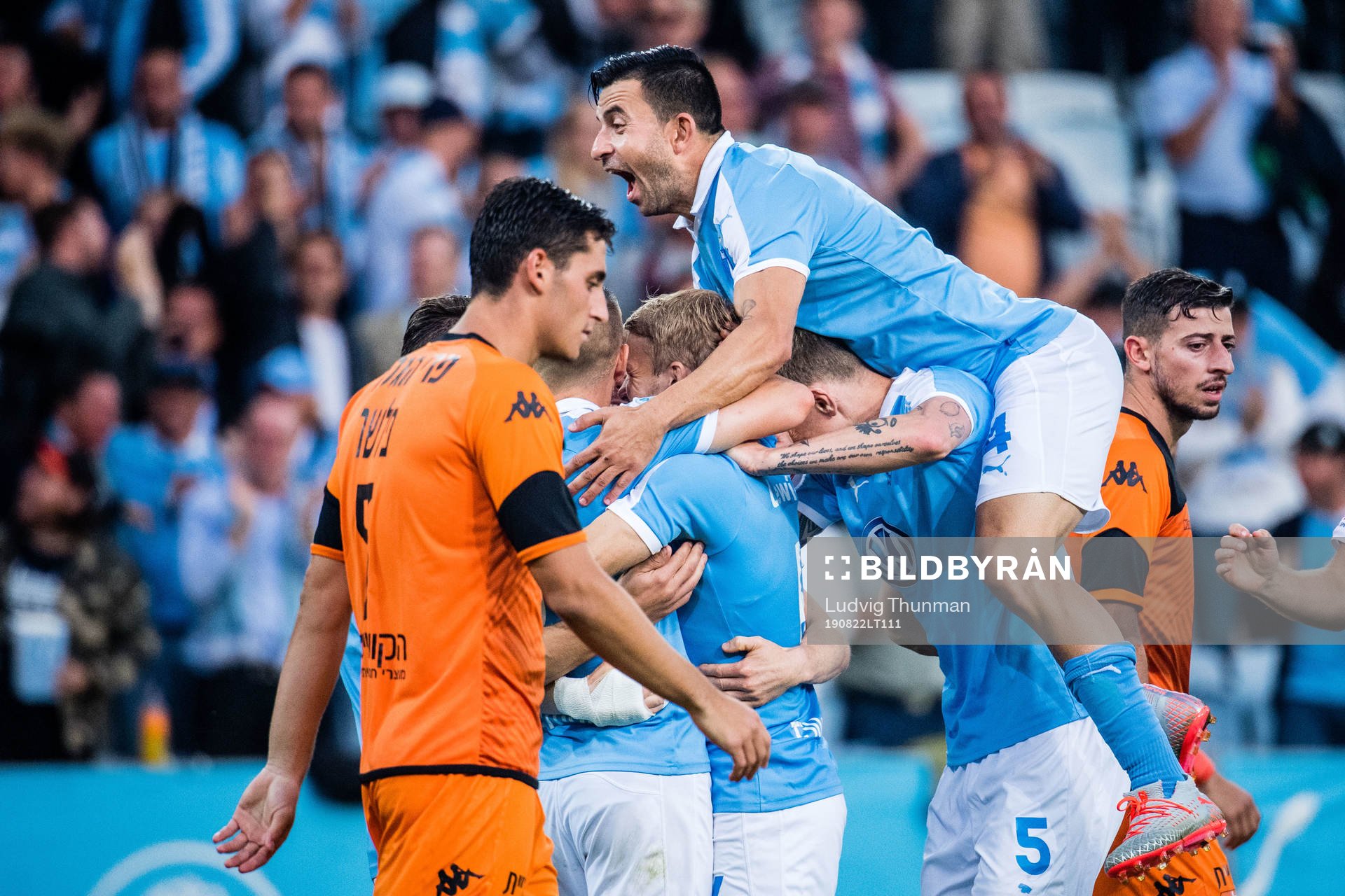 Behrang Safari of Malmö FF celebrates
