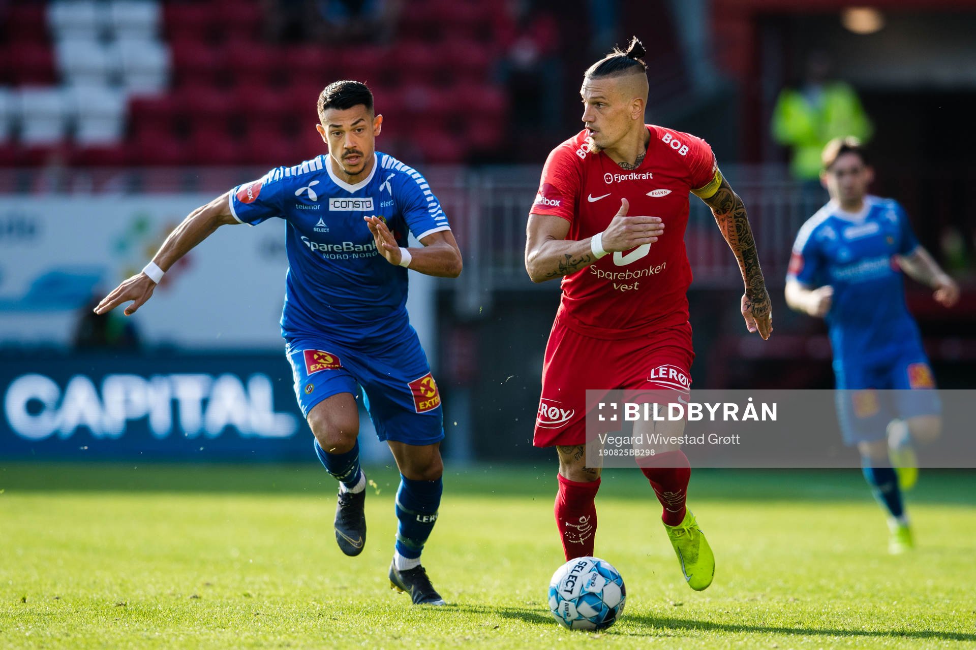 Fitim Azemi of Tromsø and Thomas Grøgaard of Brann
