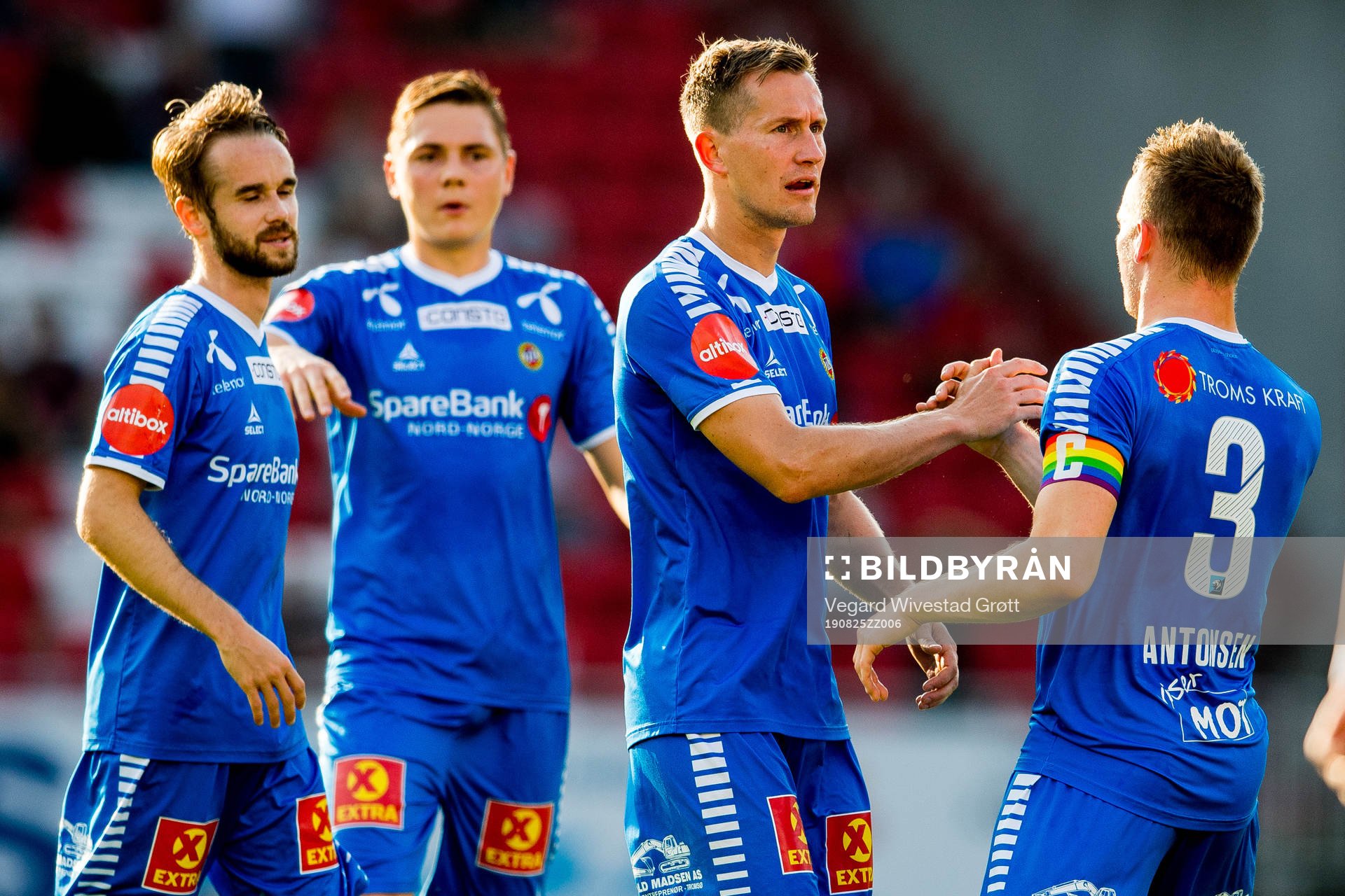 Morten Gamst Pedersen of Tromsø celebrates with teammate