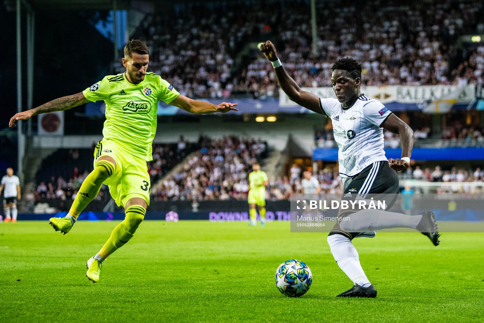 Petar Stojanovic of Dinamo Zagreb and Babajide David