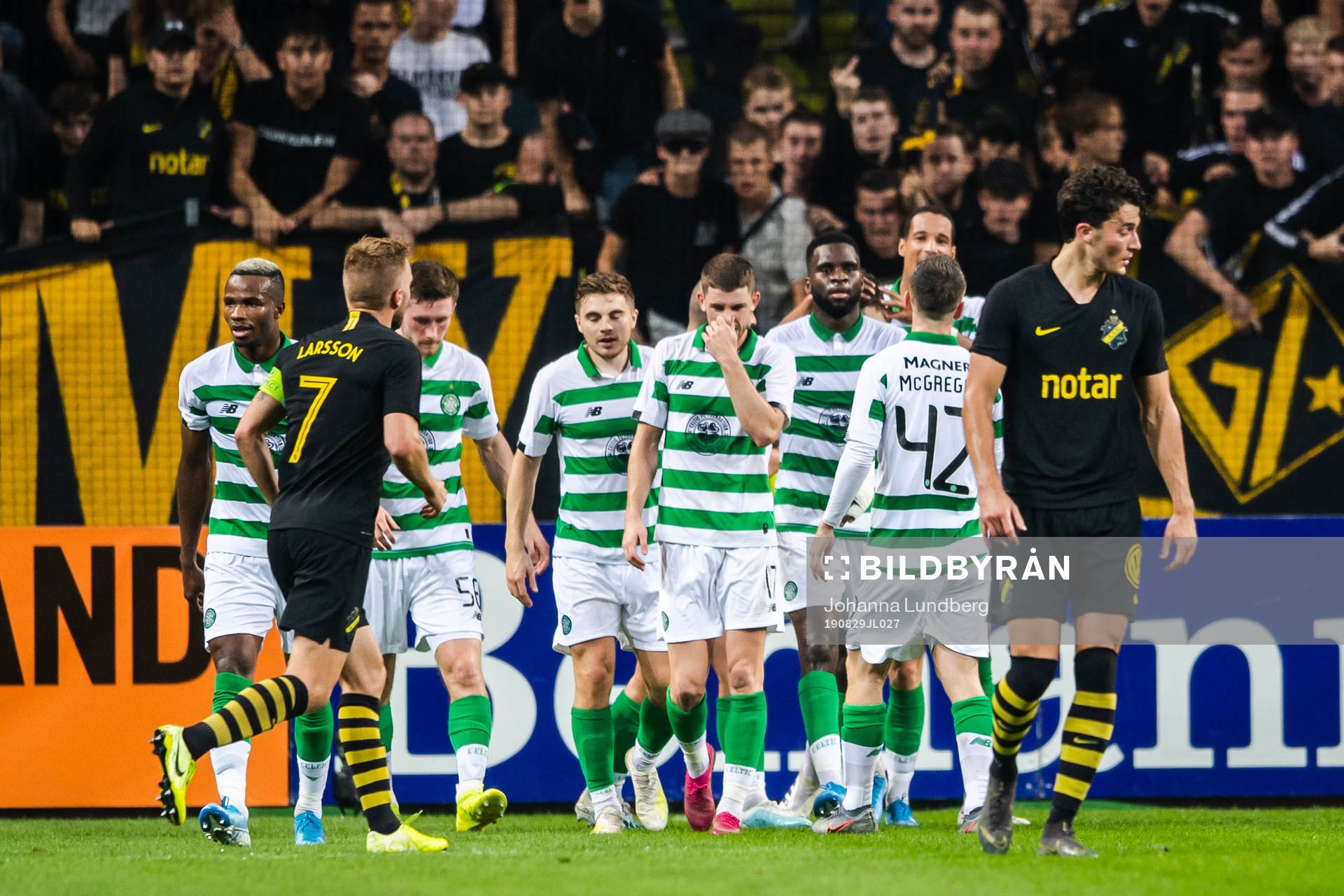 Michael Hohnston of Celtic celebrate with teammates