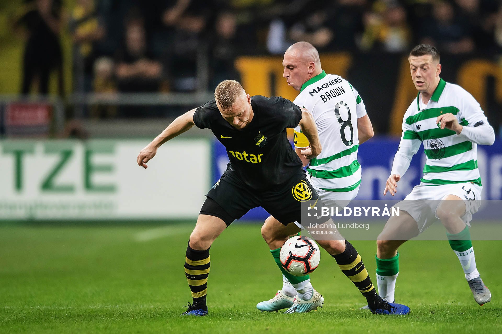 Kolbeinn Sigthorsson of AIK against Scott Brown and Callum