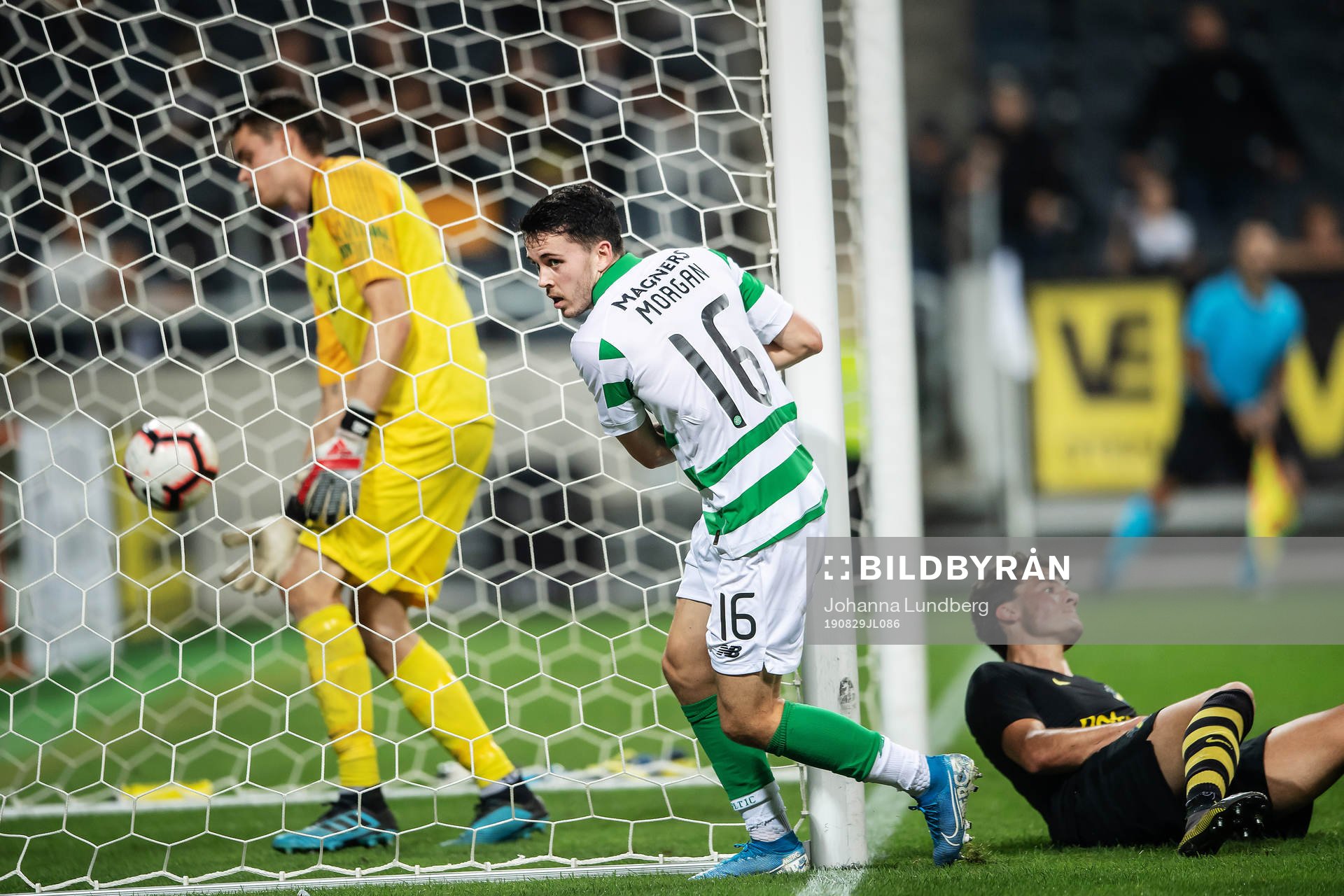 Lewis Morgan of Celtic scores 1-4 behind goalkeeper Oscar