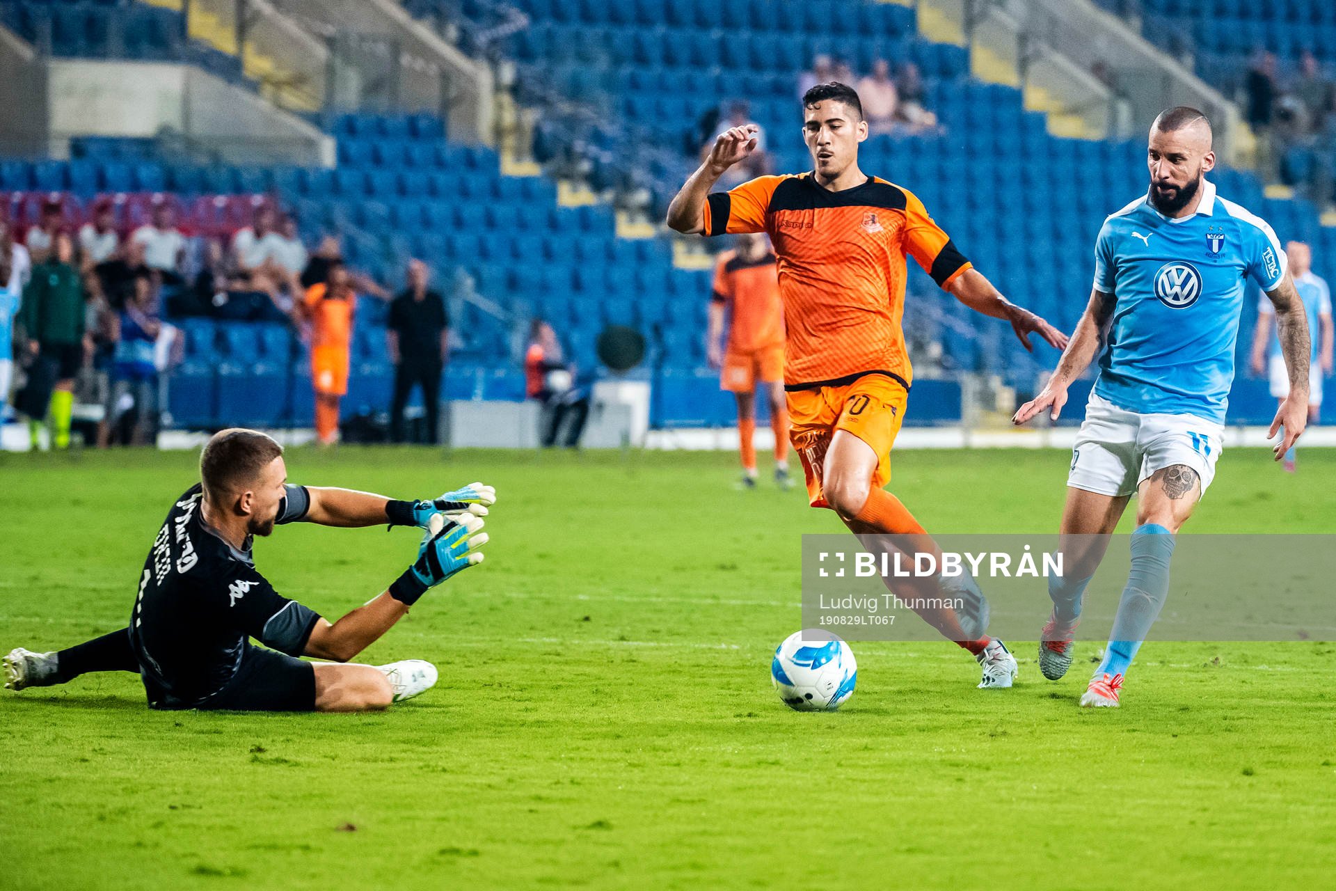 Amit Zenati and goalkeeper Emilijus Zubas of Bnei Yehuda