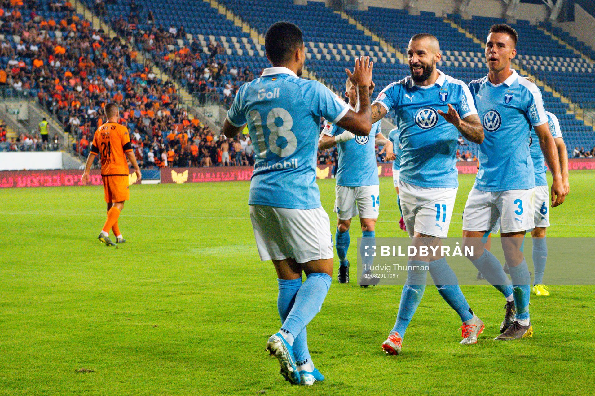 Guillermo Molins celebrates with Romain Gall and Jonas