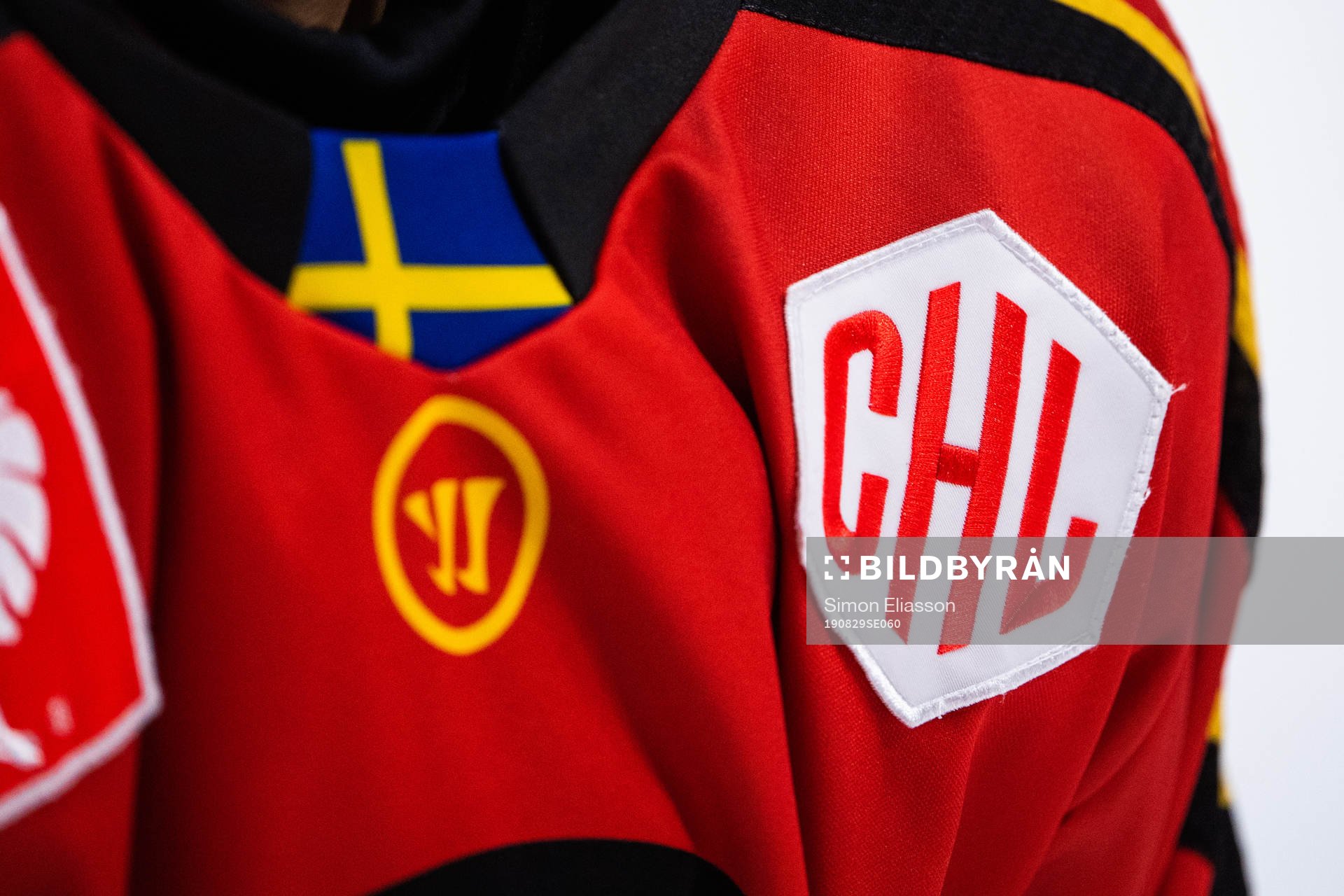 General picture of the Swedish flag and the CHL logo