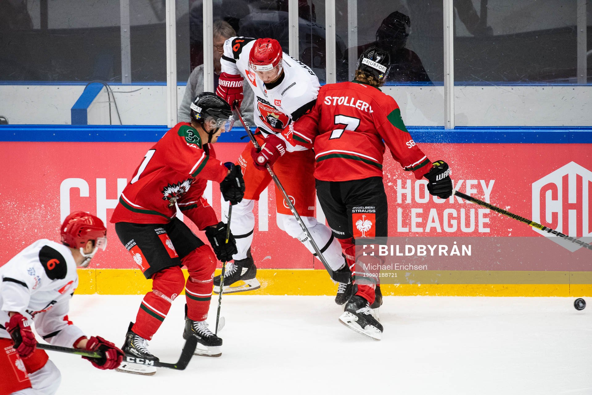 Karl Stollery of Frölunda hits Daniel Rakos  of Mountfield