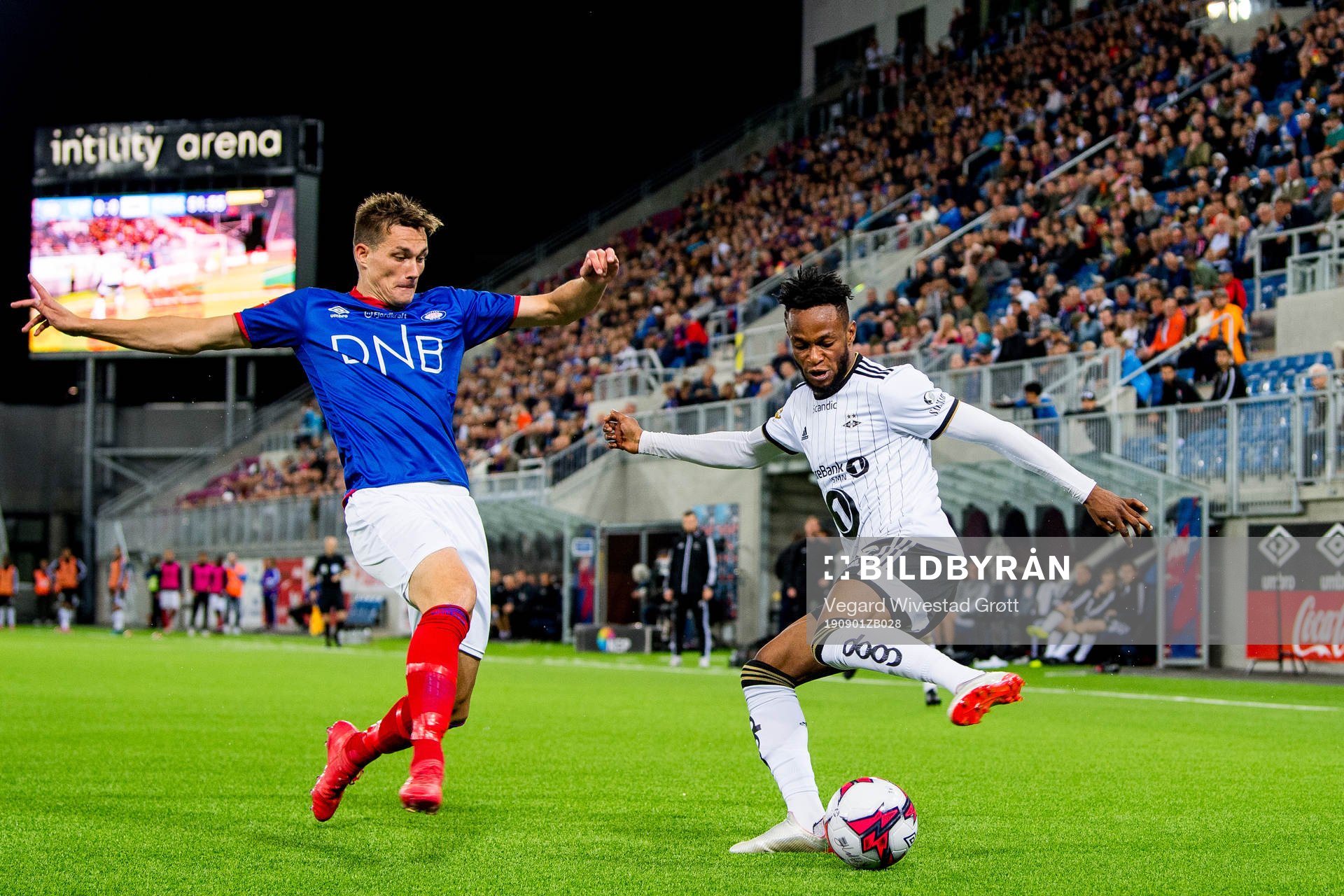 Johan Lædre Bjørdal of Vålerenga and Samuel Adegbenro of Rosenborg during the Eliteserien football match between Vålerenga and Rosenborg on September 1, 2019 in Oslo.