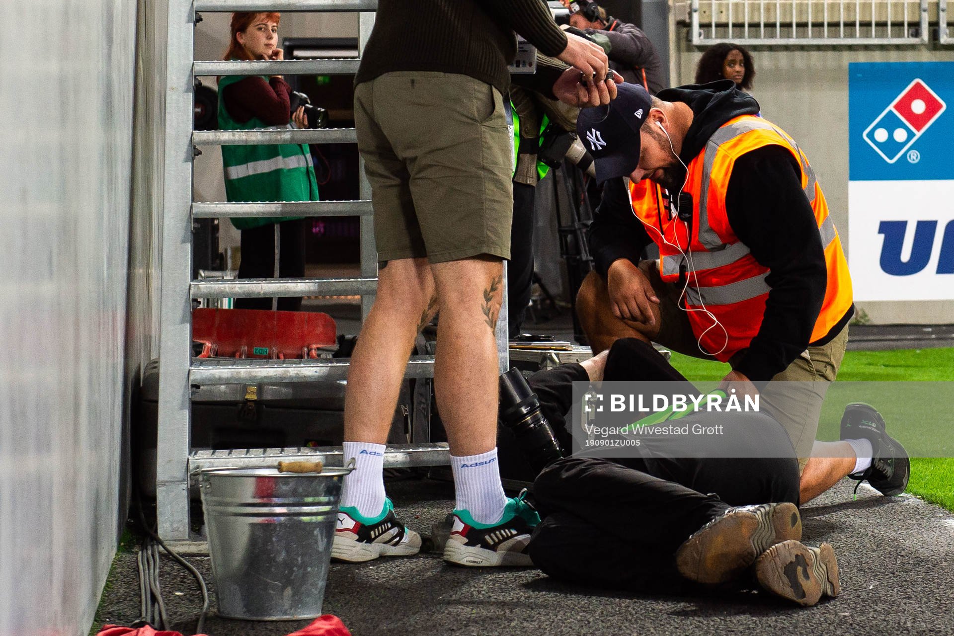 A photographer receives medical attention