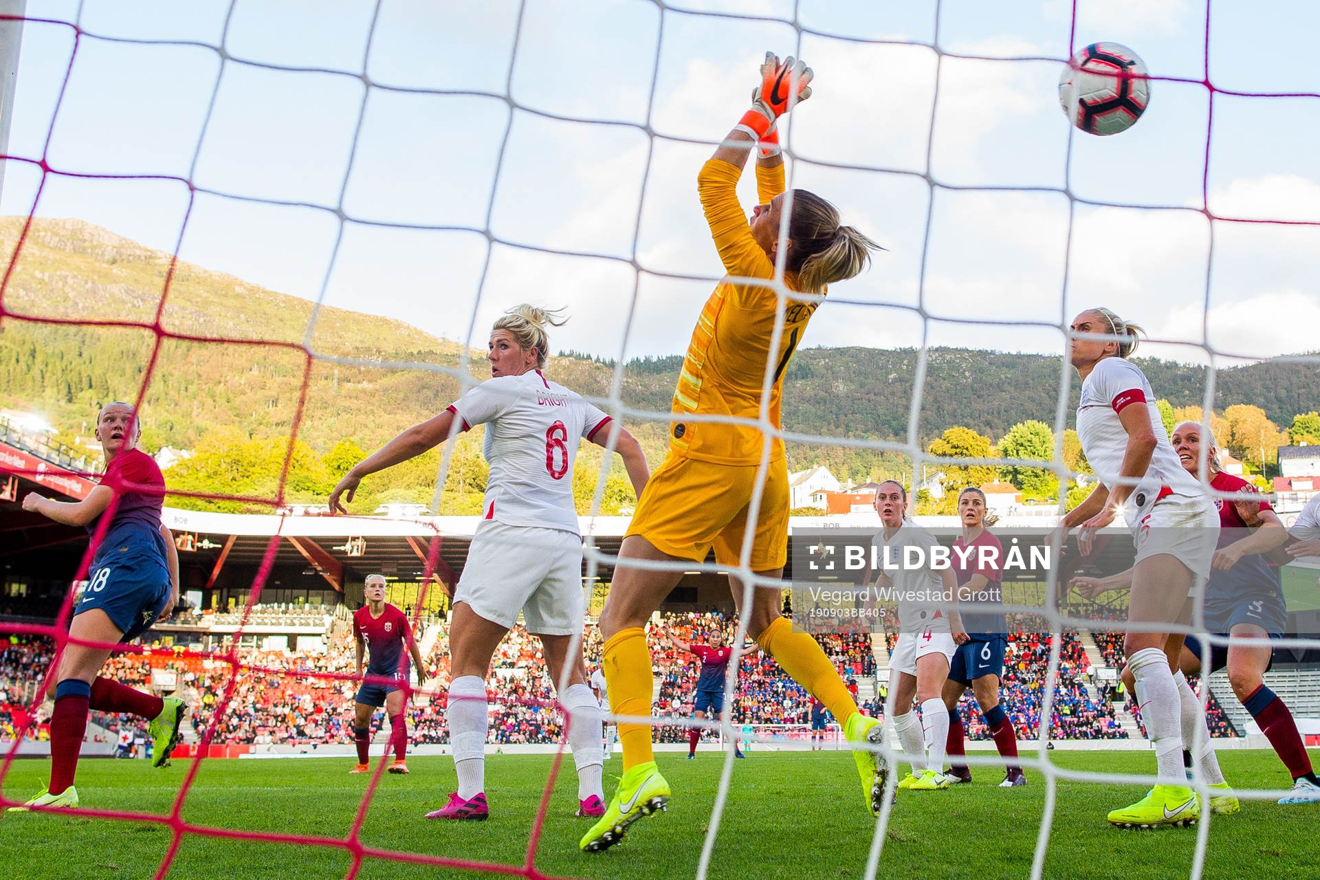 Frida Maanum of Norway scores 1-1 behind goalkeeper Carly