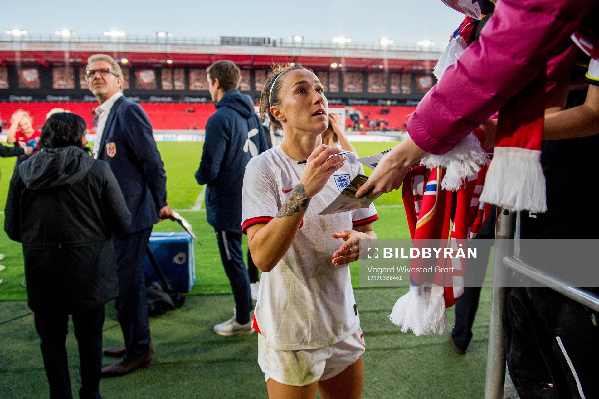 Lucy Bronze of England signs autographs