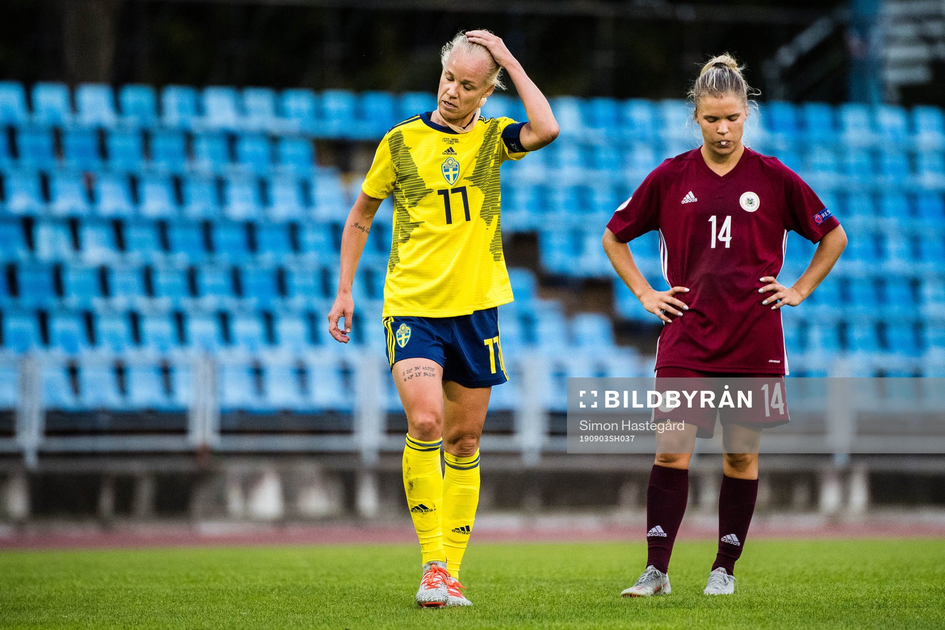 Caroline Seger of Sweden and Olga Sevcova of Latvia looks