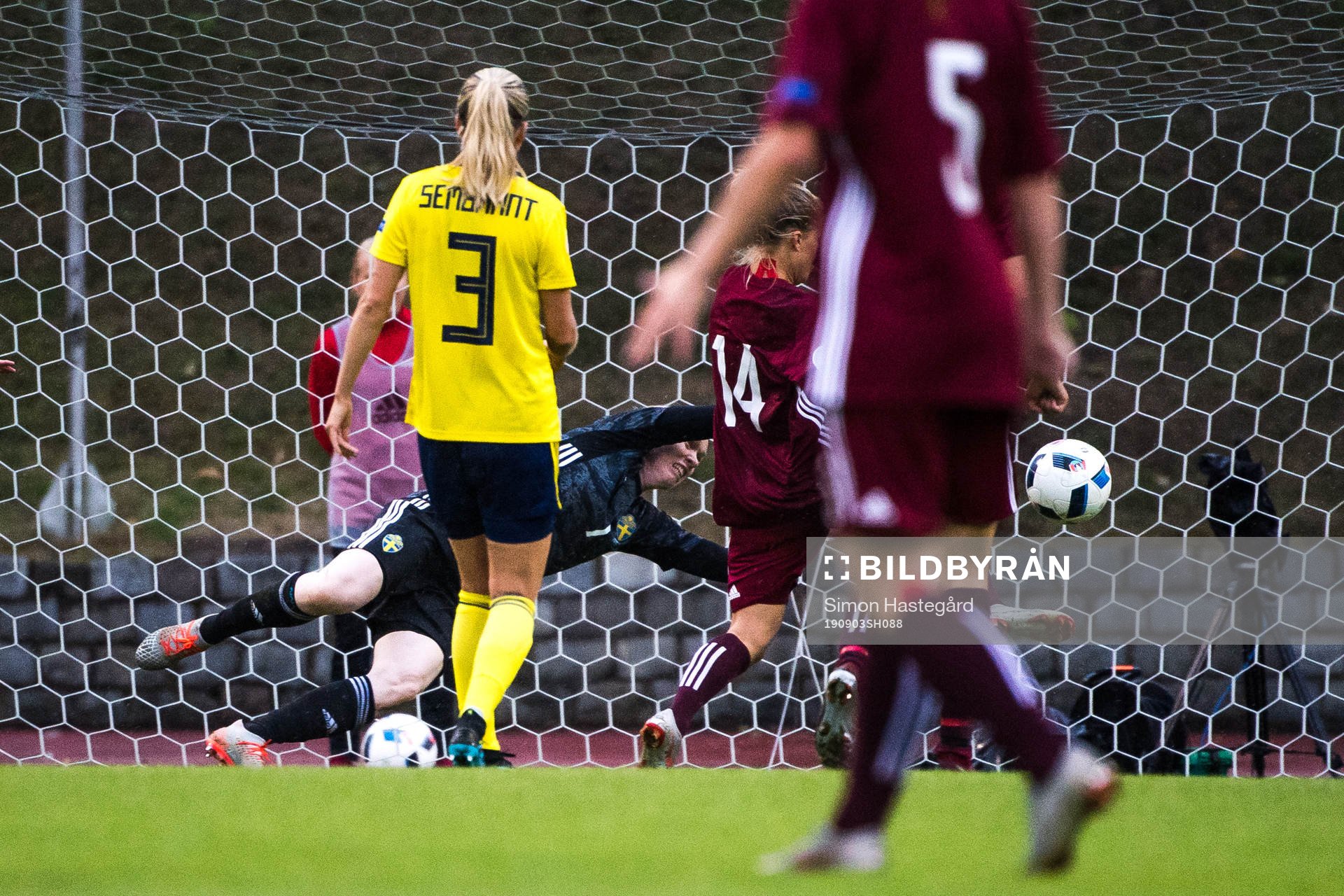 Olga Sevcova of Latvia scores the 1-0 goal behind